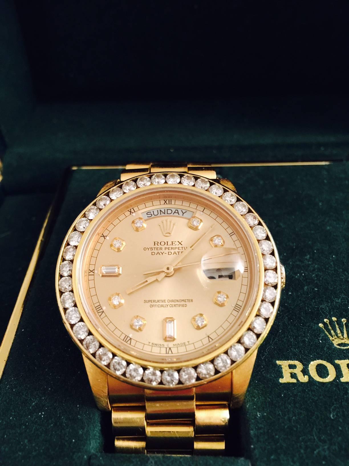 Beautiful Rolex President 18-karat yellow gold wristwatch Ref 18038. This spectacular wristwatch dates from approximately 1982 and features a custom channel set 2+ carat diamond bezel with champagne diamond dial/hour markers (all aftermarket.) It is