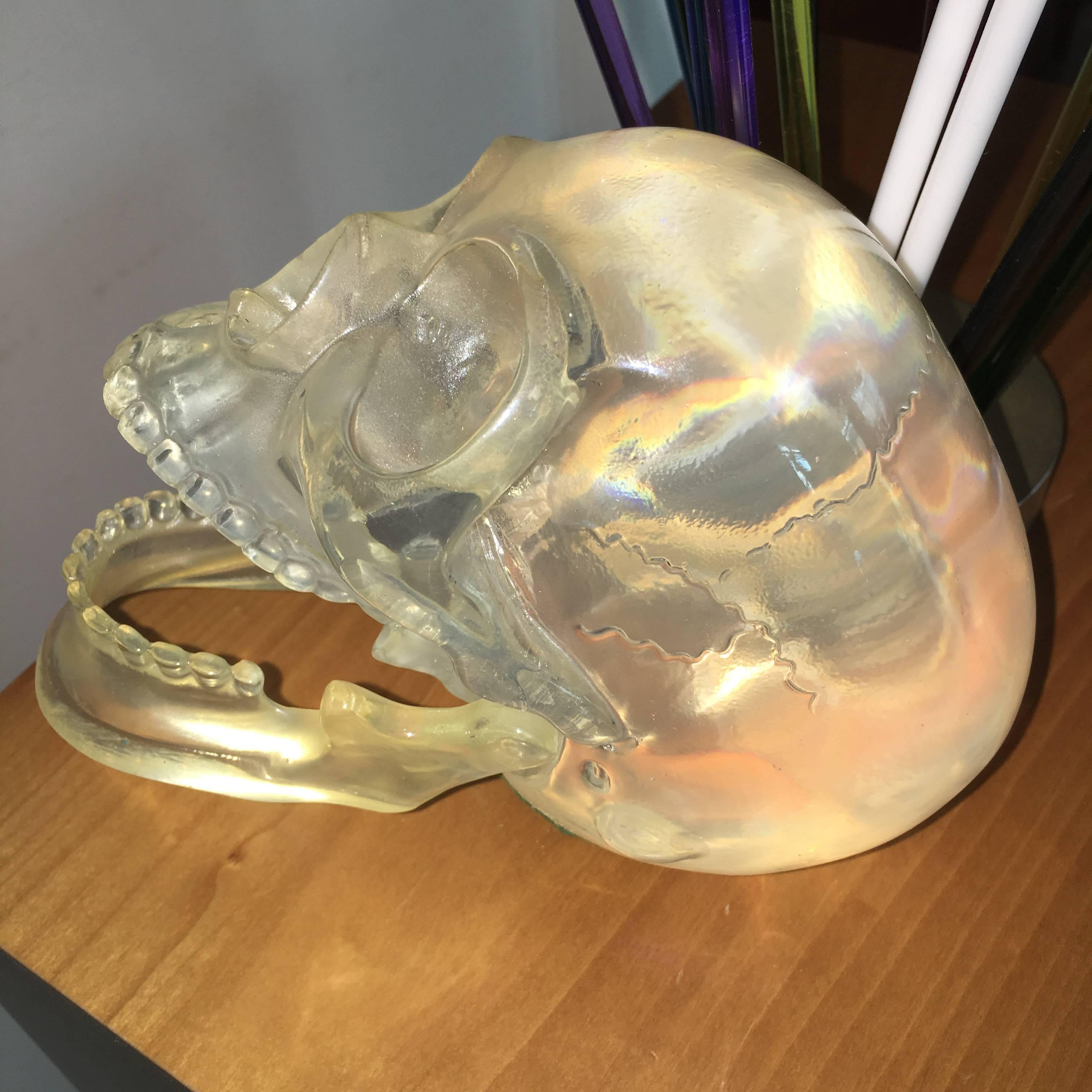 Terrific Mid-Century solid Lucite skull sculpture, circa 1970s. This interesting piece is comprised of clear Lucite with movable jaw. Said to have been sold by Harrods London.