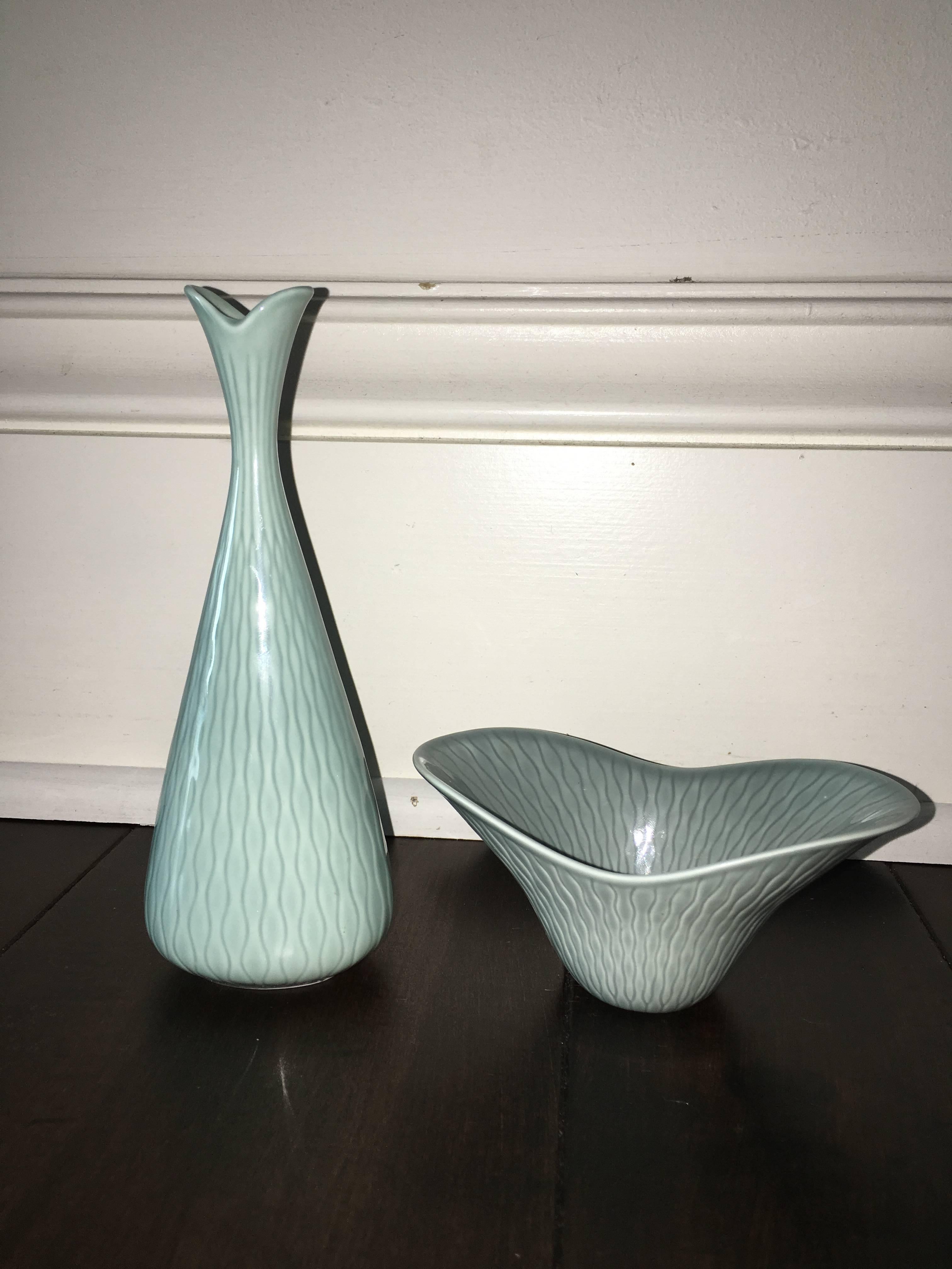 Great set of two matching porcelain pieces by Rörstrand Sweden designed by Gunnar Nylund. They each have a unique design with blueish gray color. Signed on the bottom. Bowl measures 5