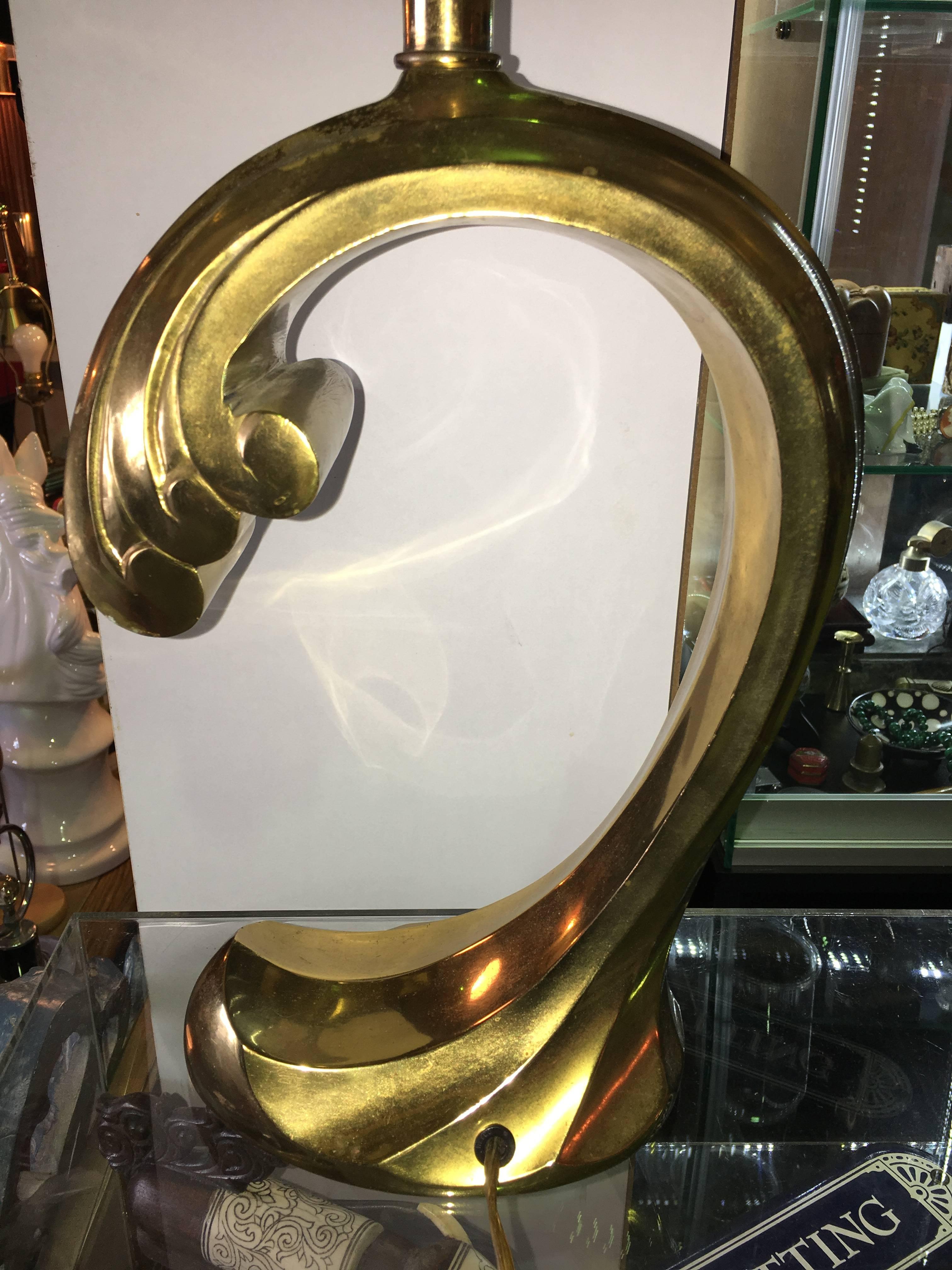 Great vintage brass wave lamp by Pierre Cardin. This unusual design is comprised of a solid brass frame in the wave form. Great vintage lamp for your home or office. Lampshade not included.