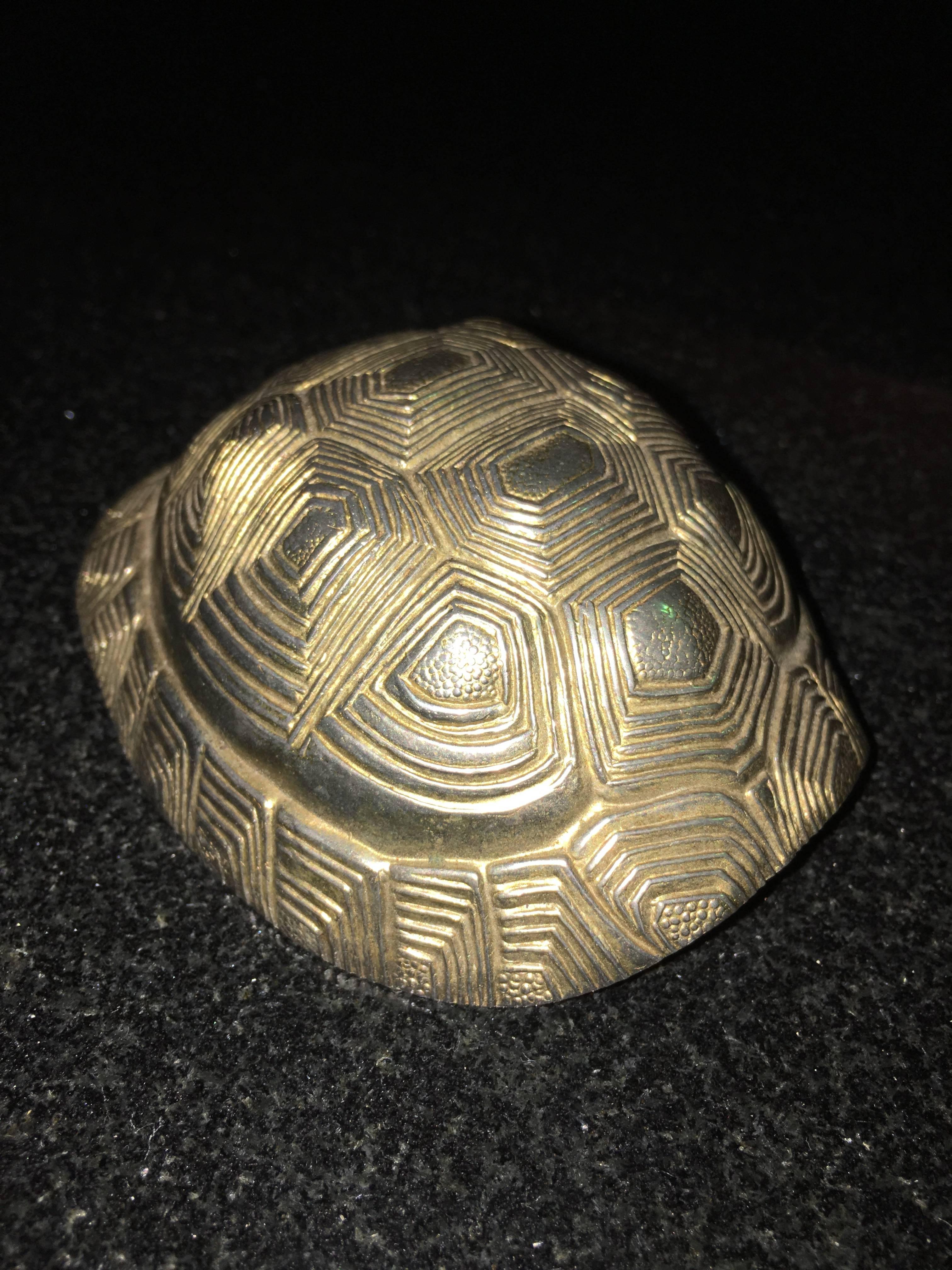 Terrific vintage Italian turtle shell bottle opener. This unusual piece is very well made of solid brass with chrome bottom depicting a detailed turtle shell. Marked with Made In Italy Label likely designed by Tommaso Barbi. Perfect addition to your