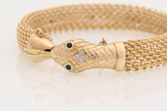 14-Karat Gold Snake Bracelet with Emerald Eyes and Diamonds