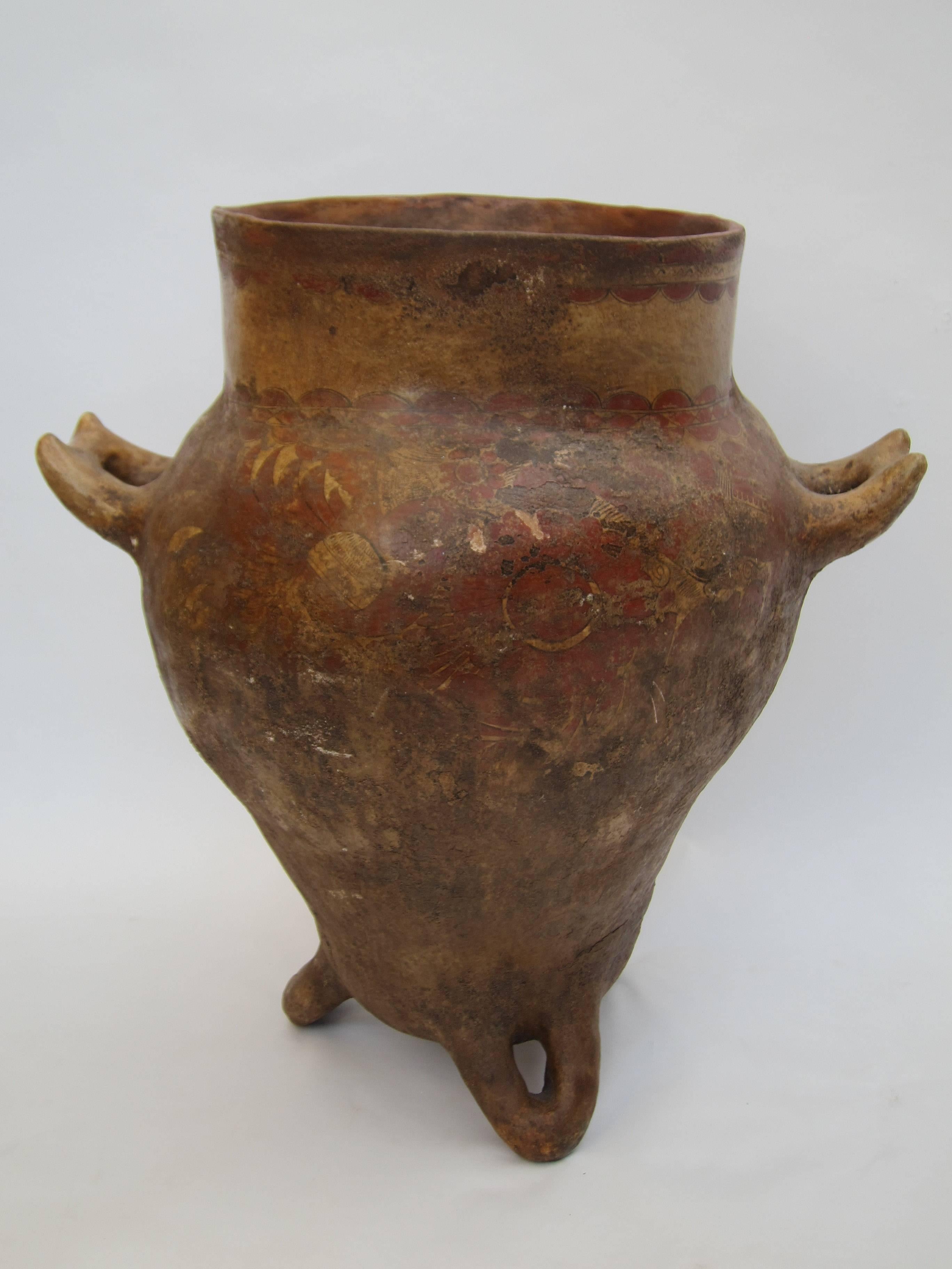 This clay water jar from the early 1900s is from the state of Guerrero which has a long tradition of pottery making which is completely distinct from any other area in the country. This particular jar is from Ameyaltepec and other designs and shapes