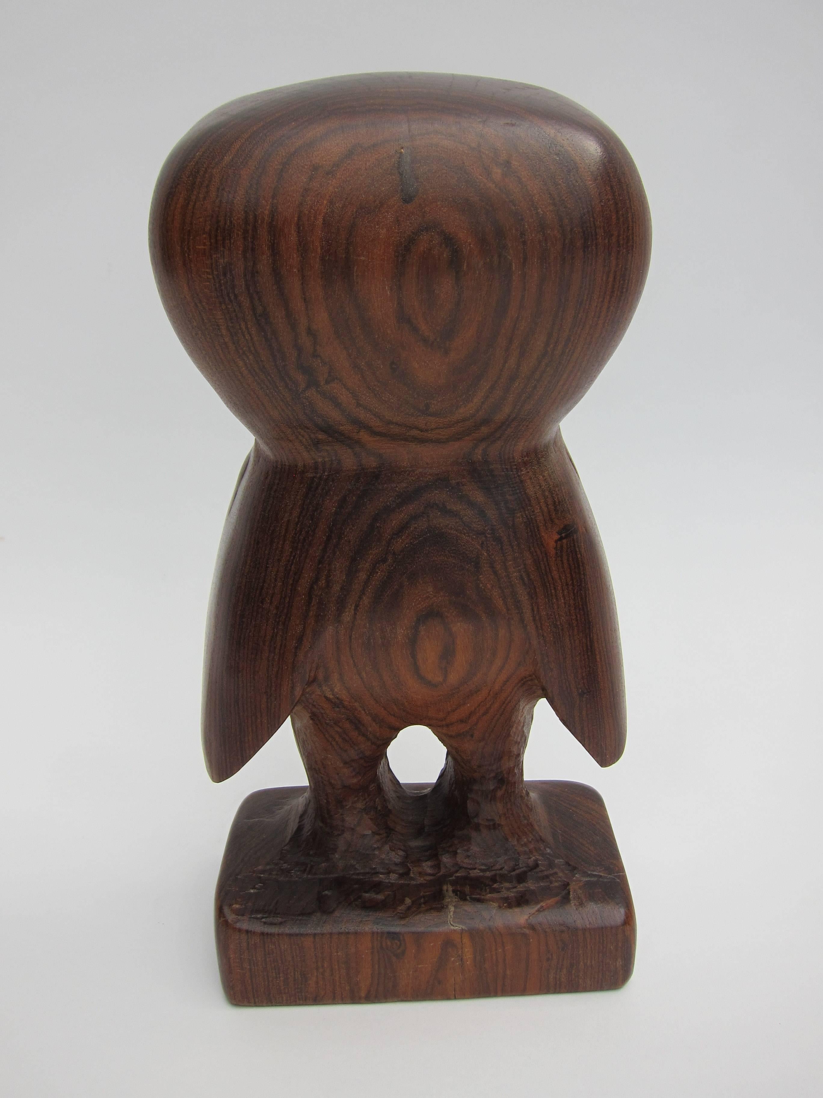 A rare carving in tropical rosewood by one of the most prominent names in Mexican modernist design. 
Don Shoemaker, an American who studied at the Fine Arts Institute of Chicago, emigrated to Mexico in the late 1940s, having fallen in love with the