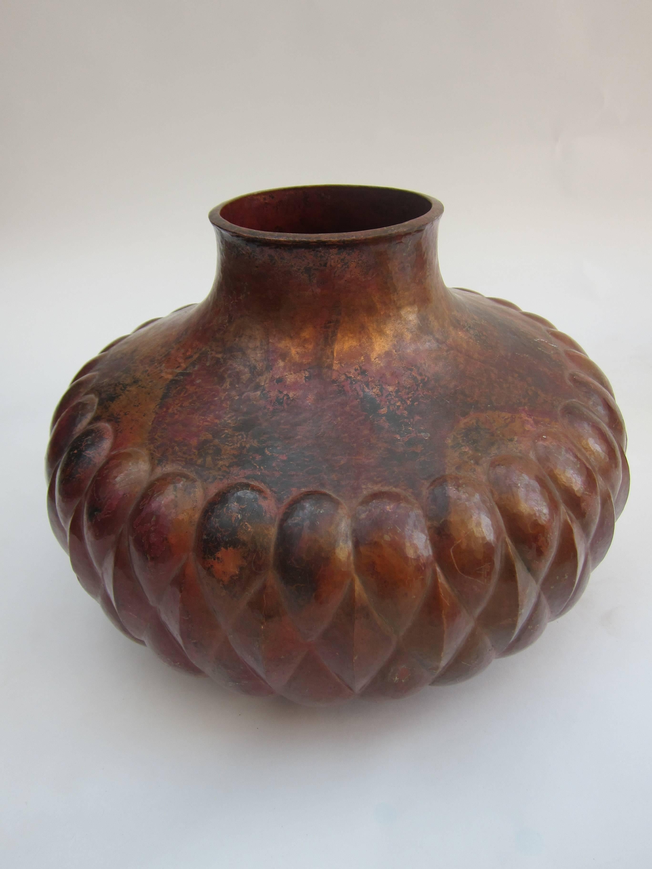 This beautifully hammered copper vessel comes from Santa Clara del Cobre, in the state of Michoacan, known for its rich tradition of superlative handicraft where early in the 16th century, the first bishop in the New Spain, Vasco de Quiroga,