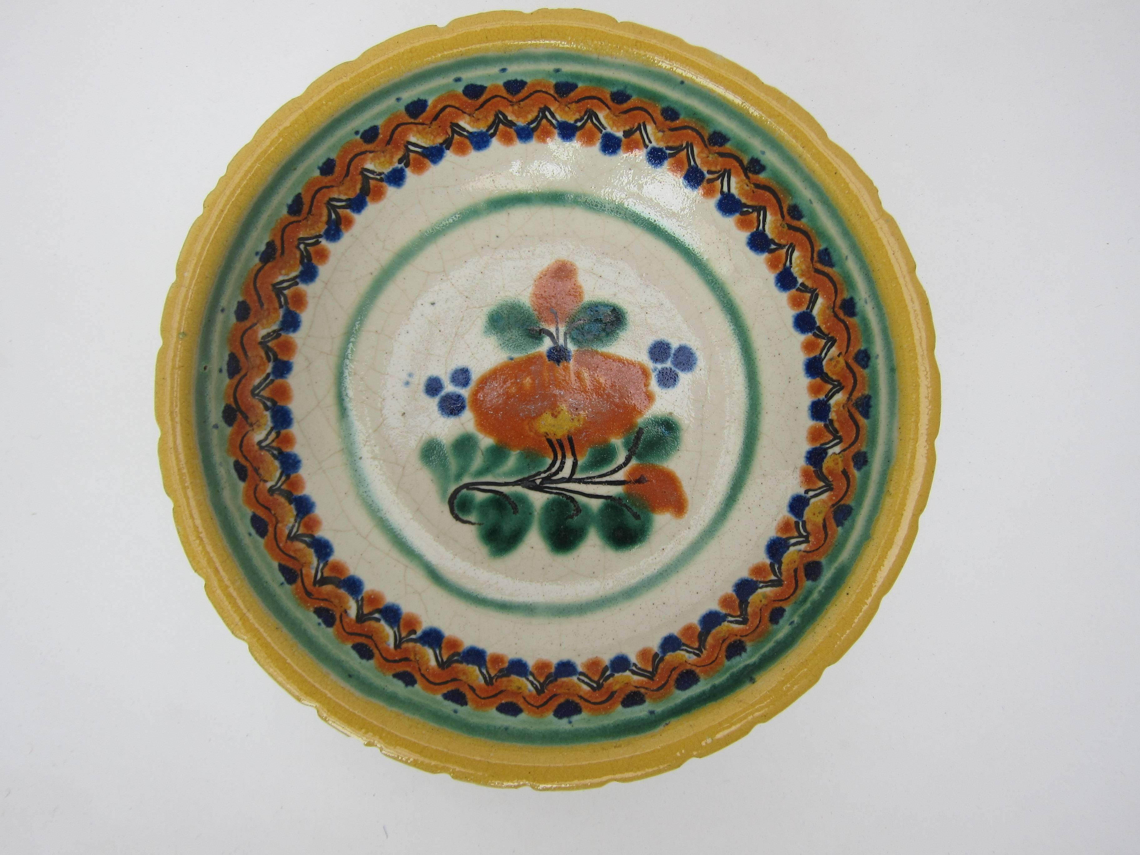 A charming variety of household bowls from Puebla and Oaxaca, dating from the 1960s and the decade after. The larger ones from Puebla are characteristically decorated with flowers and foliates and the bowls from Oaxaca, with their strong brush