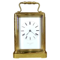 An Engraved One Piece Carriage Clock with a Rare Platform Escapement.