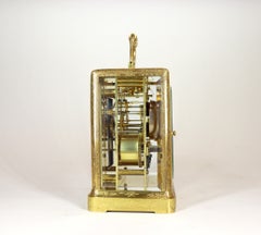 An Engraved One Piece Carriage Clock with a Rare Platform Escapement.