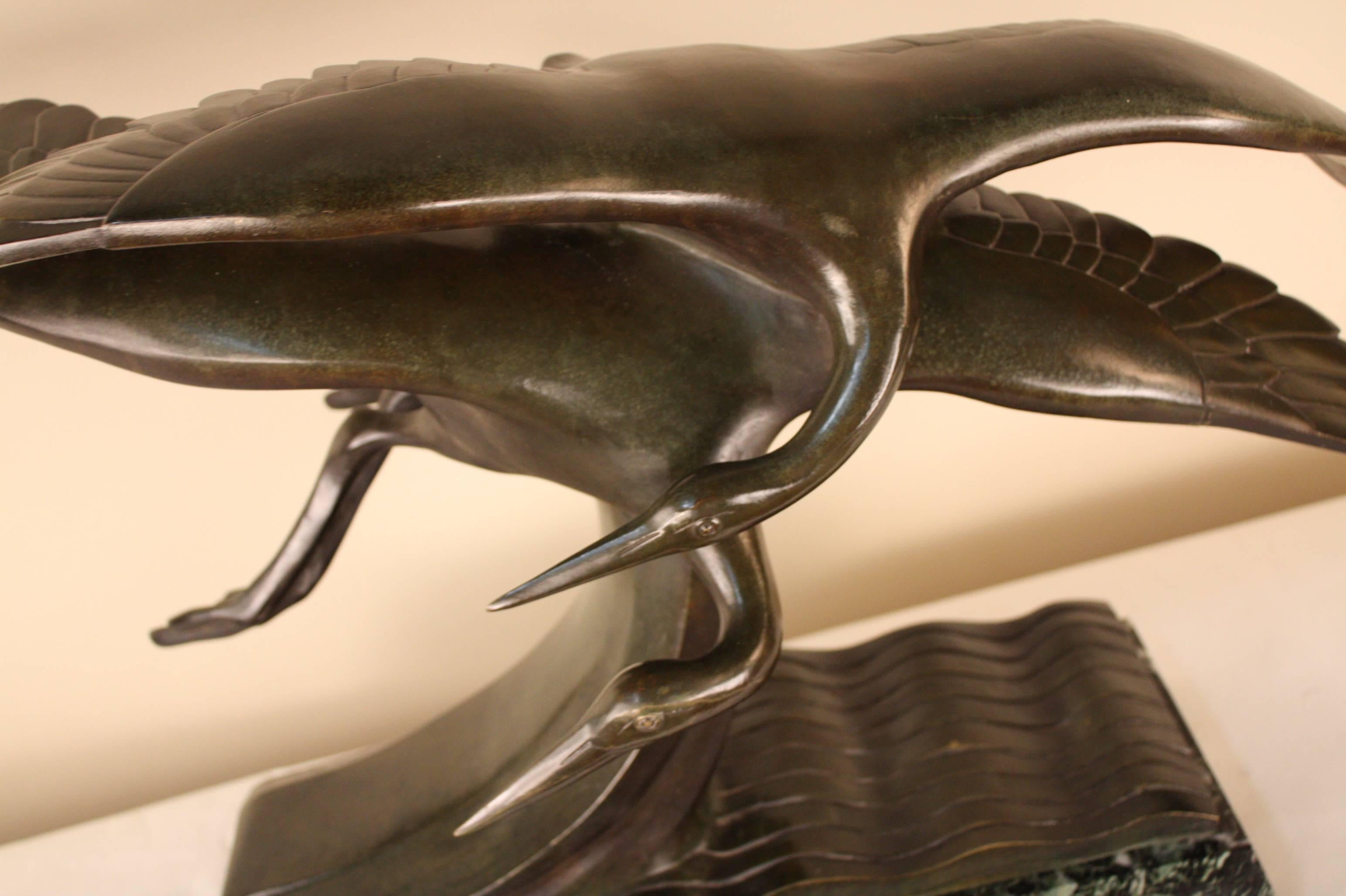 Fabulous French bronze sculpture flying birds in motion circle 1930s by Alexandre Kelety.
This bronze sculpture was a presentation piece to mayor of Ambérieux en Dombes,1 France.