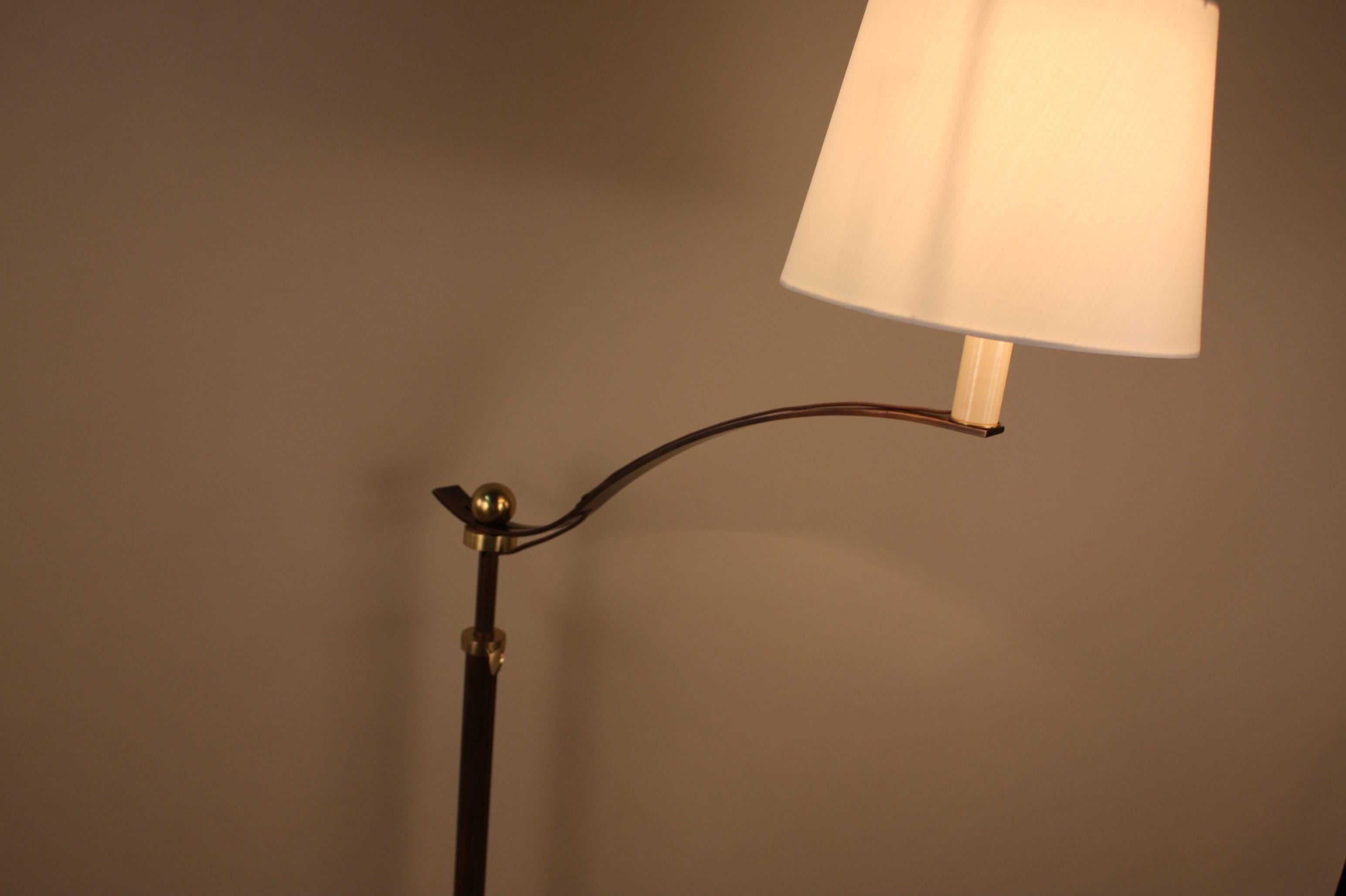 This unique and elegant floor lamp has adjustable height as well as adjustable arm for positioning the arm for perfect reading position.