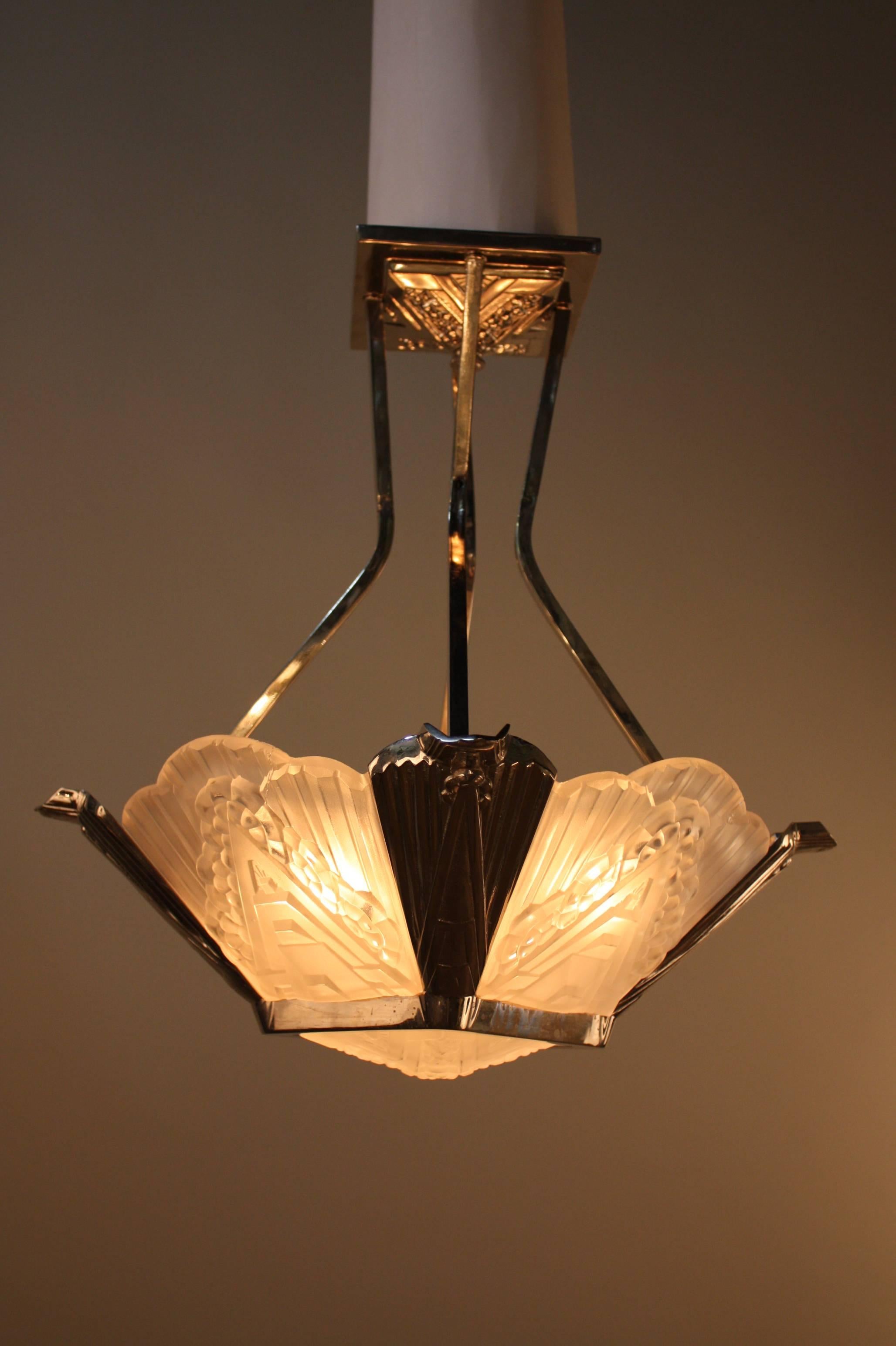 Elegant design five-panel, five-light nickel on bronze French Art Deco chandelier.
