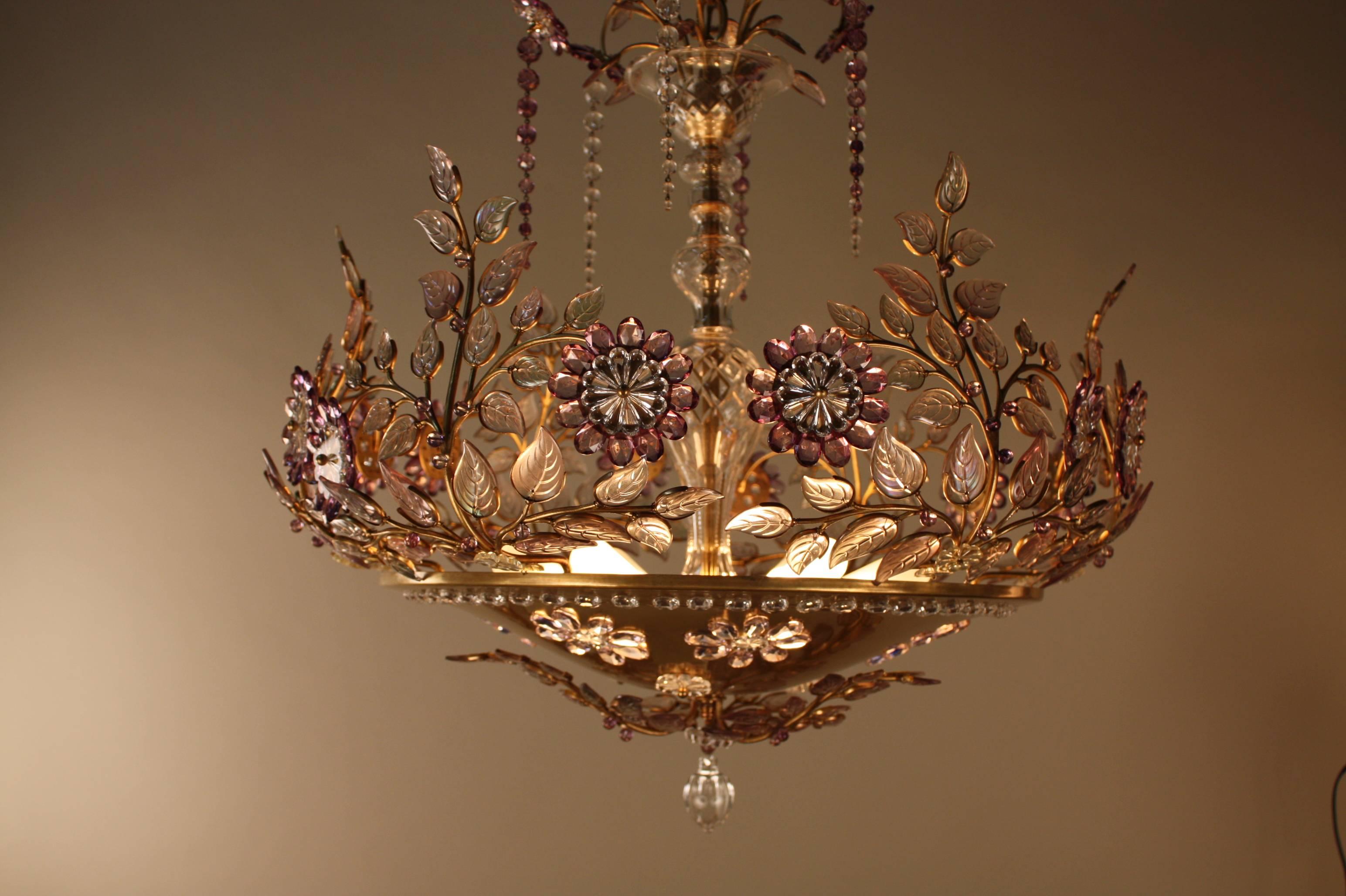 A fantastic handmade leaves and flora design in clear and amethyst crystal chandelier by Maison Bagues.