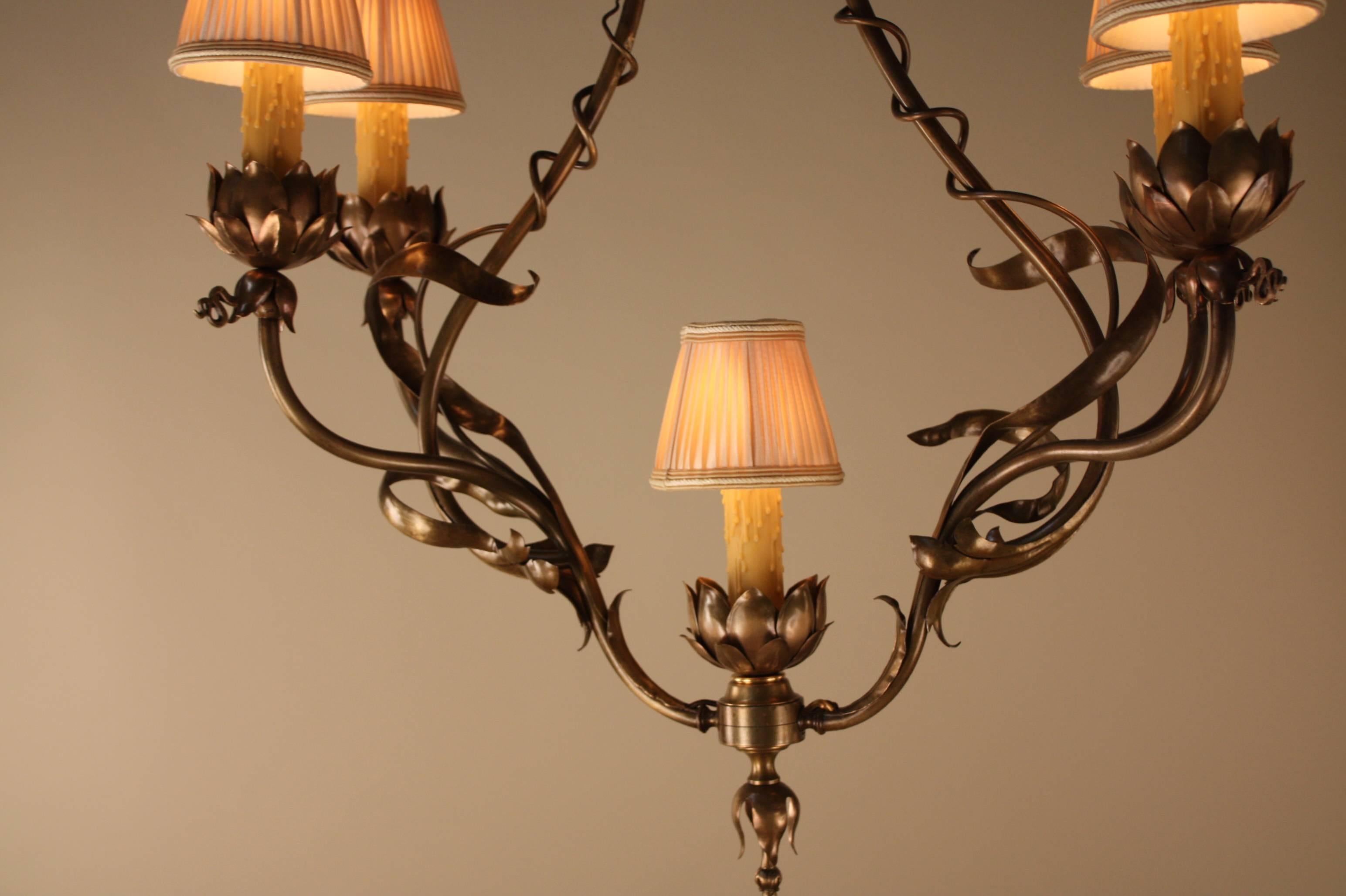 Fantastic electrified gas five-light French19th century bronze Art Nouveau chandelier and fitted with pleated silk lampshades.
The measurement below is without lampshade.