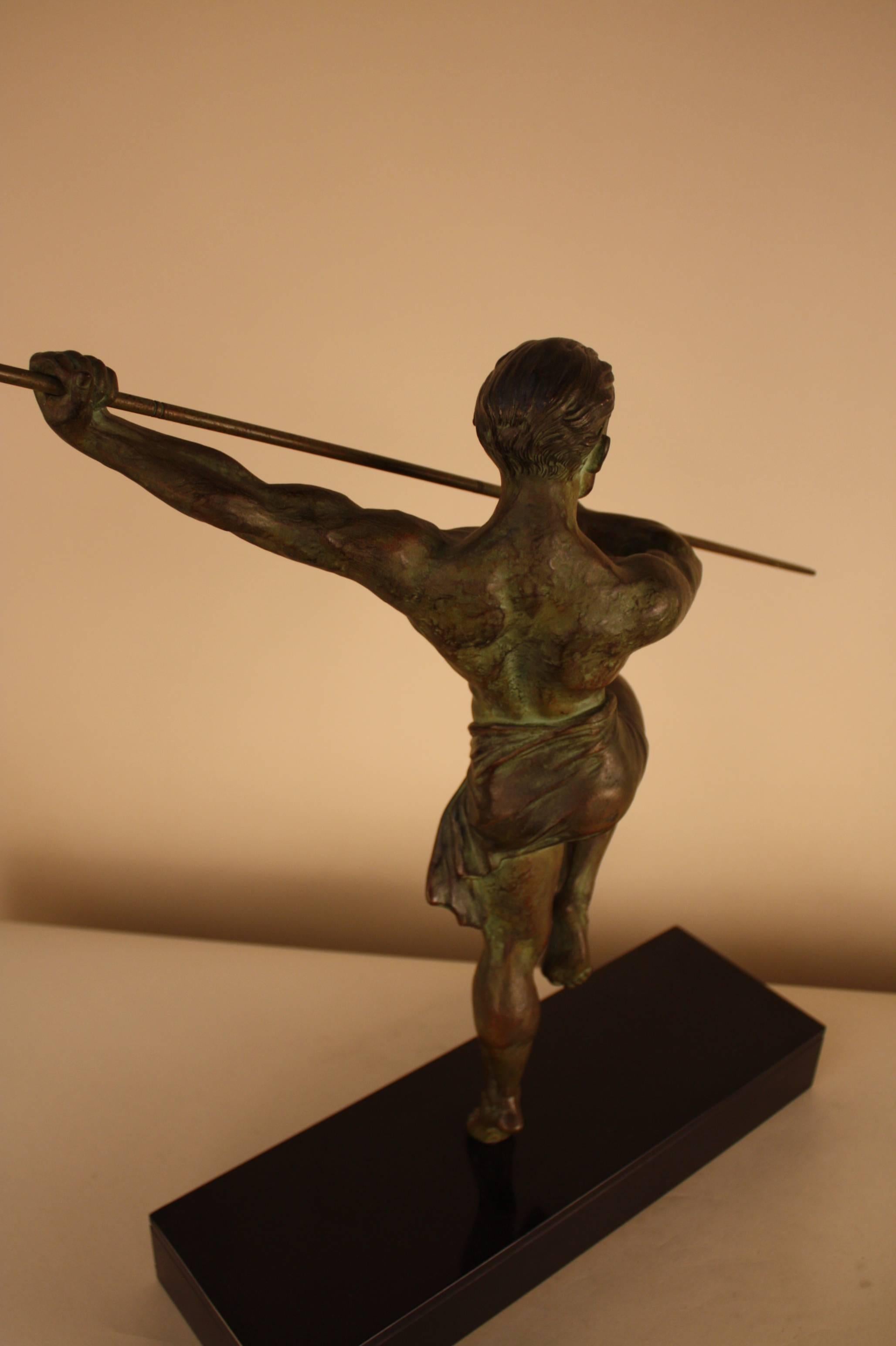 Patinated French Art Deco Sculpture of Nude Man with Spear by R. Varnier