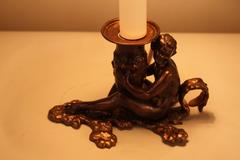 Young God with an Amphora Candlestick Lamp