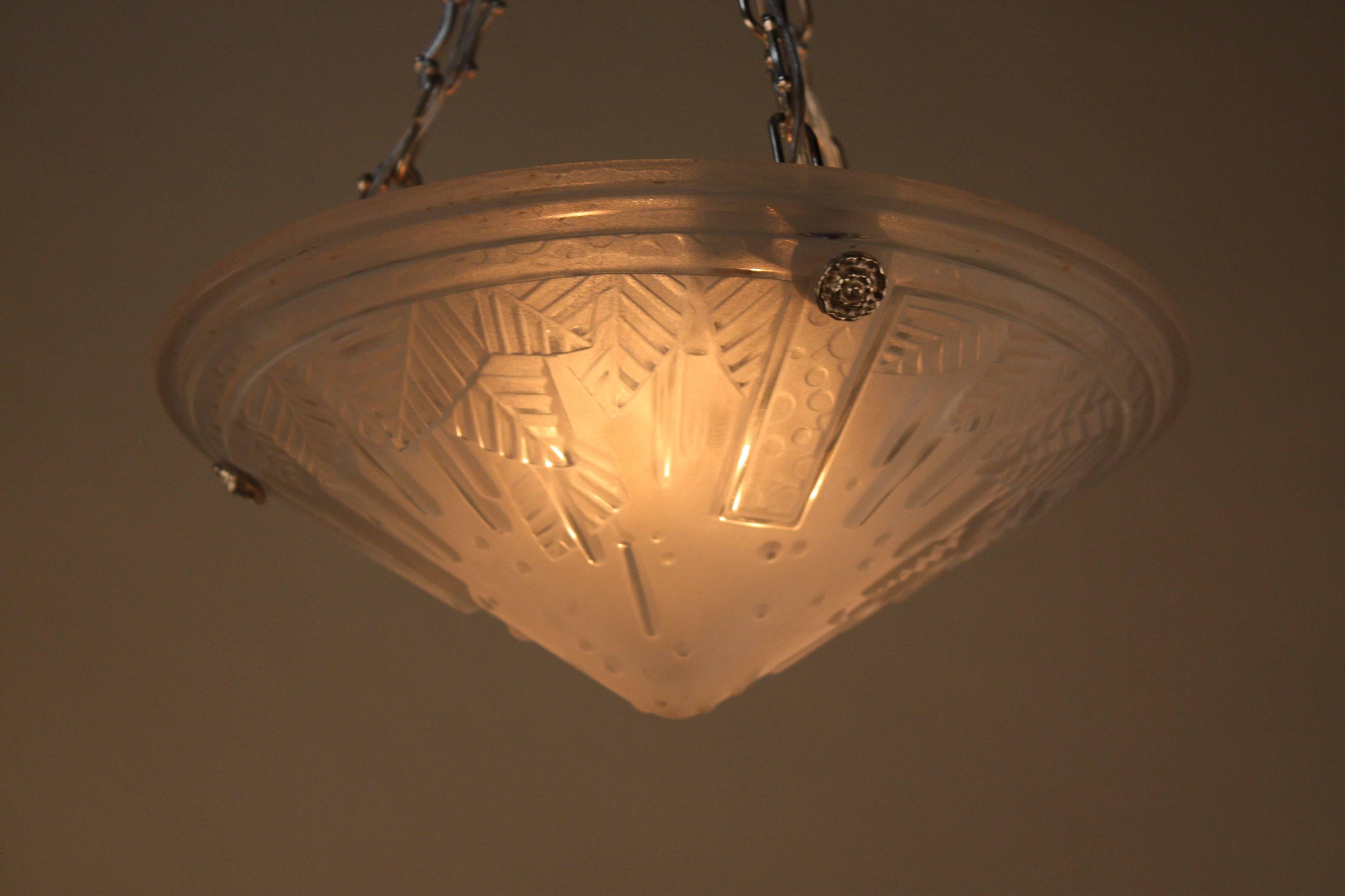 Wonderful three-light Art Deco with geometric design glass chandelier with nickel on bronze hardware by Muller Freres.