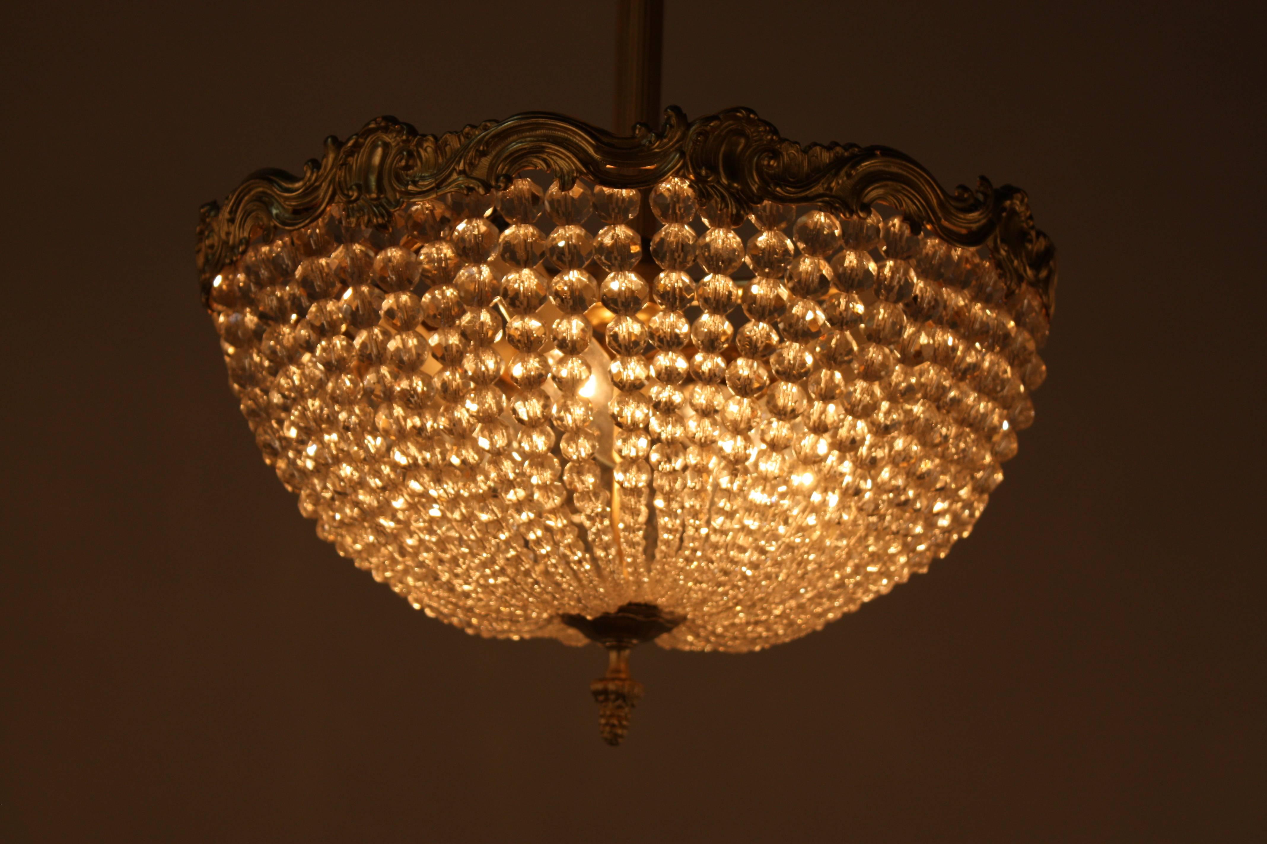 Elegant bronze and crystal basket semi flush mount six-light chandelier.