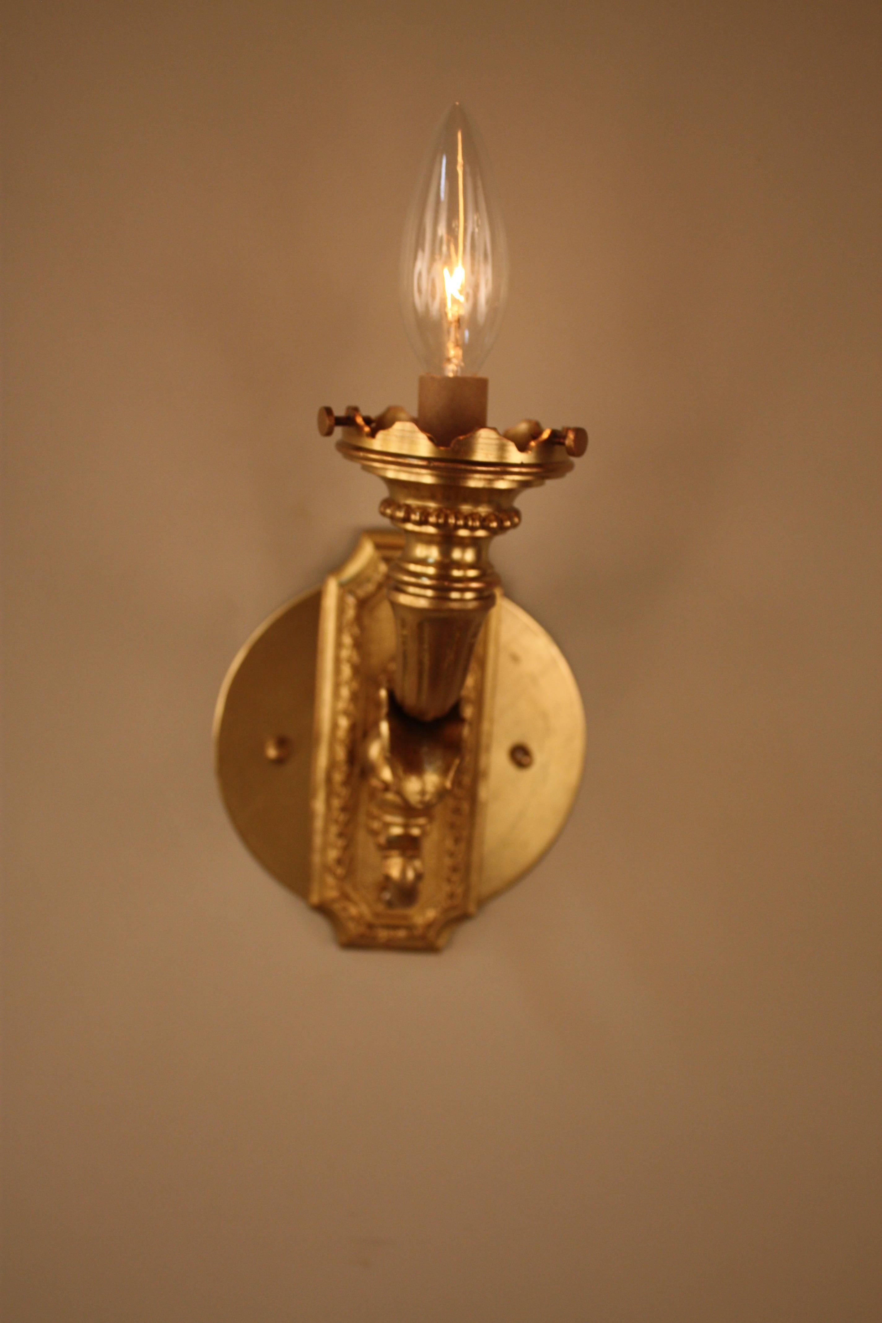 Early 20th Century Pair of Bronze Torch Flame Glass Wall Sconces