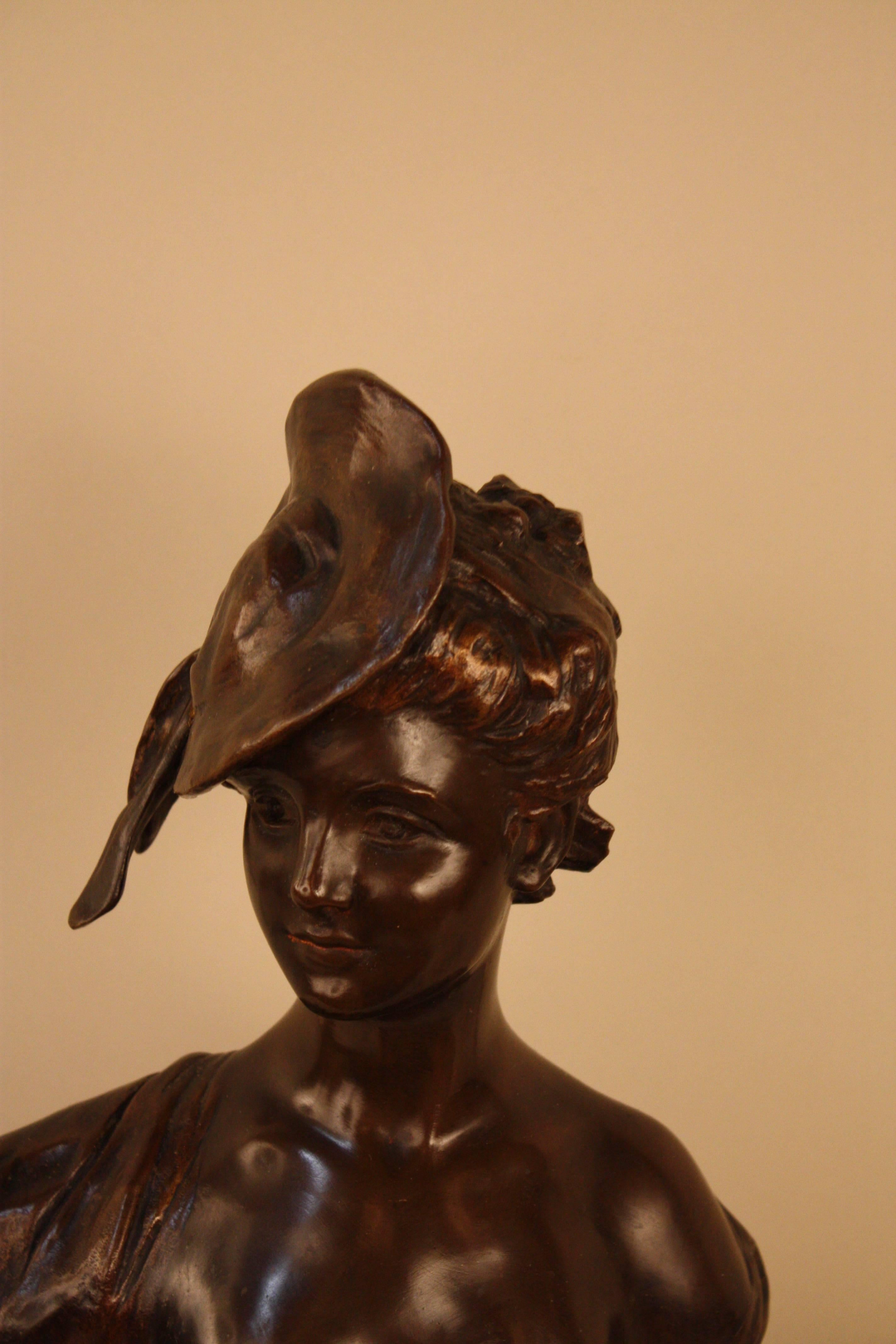 A lovely bronze bust of young Parisian women with stylized hat by Belgian sculpture Georges Van der Straeten.
He moved to Paris 1883 and many foundries have work on his pieces including.
 The Bronze Society of Paris, the founder Pinedo and