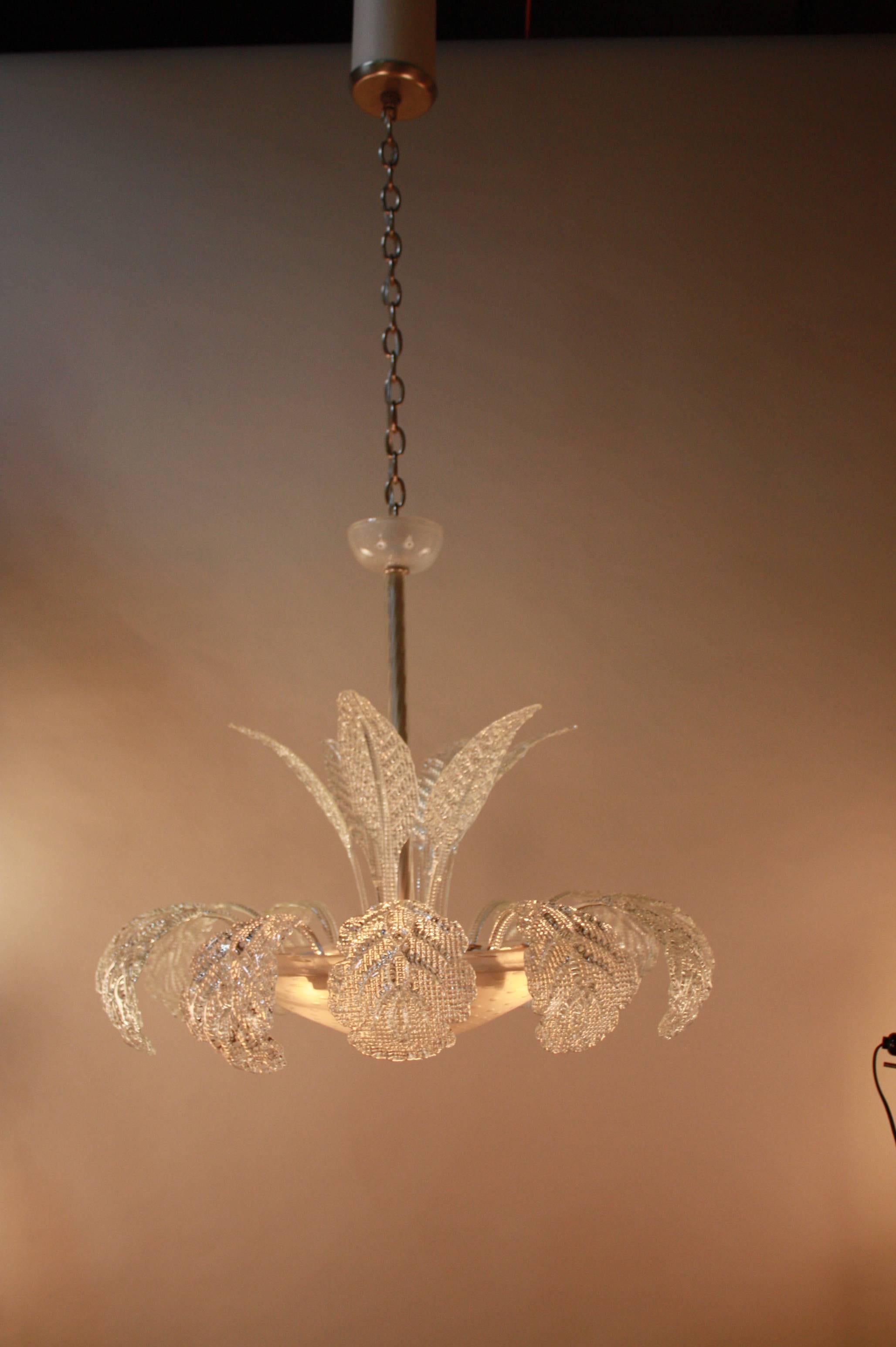 Exquisite handblown Murano glass eighteen leaves six-light chandelier by Barovier & Toso. This chandelier is 29" wide, 32" height with some extra chain.