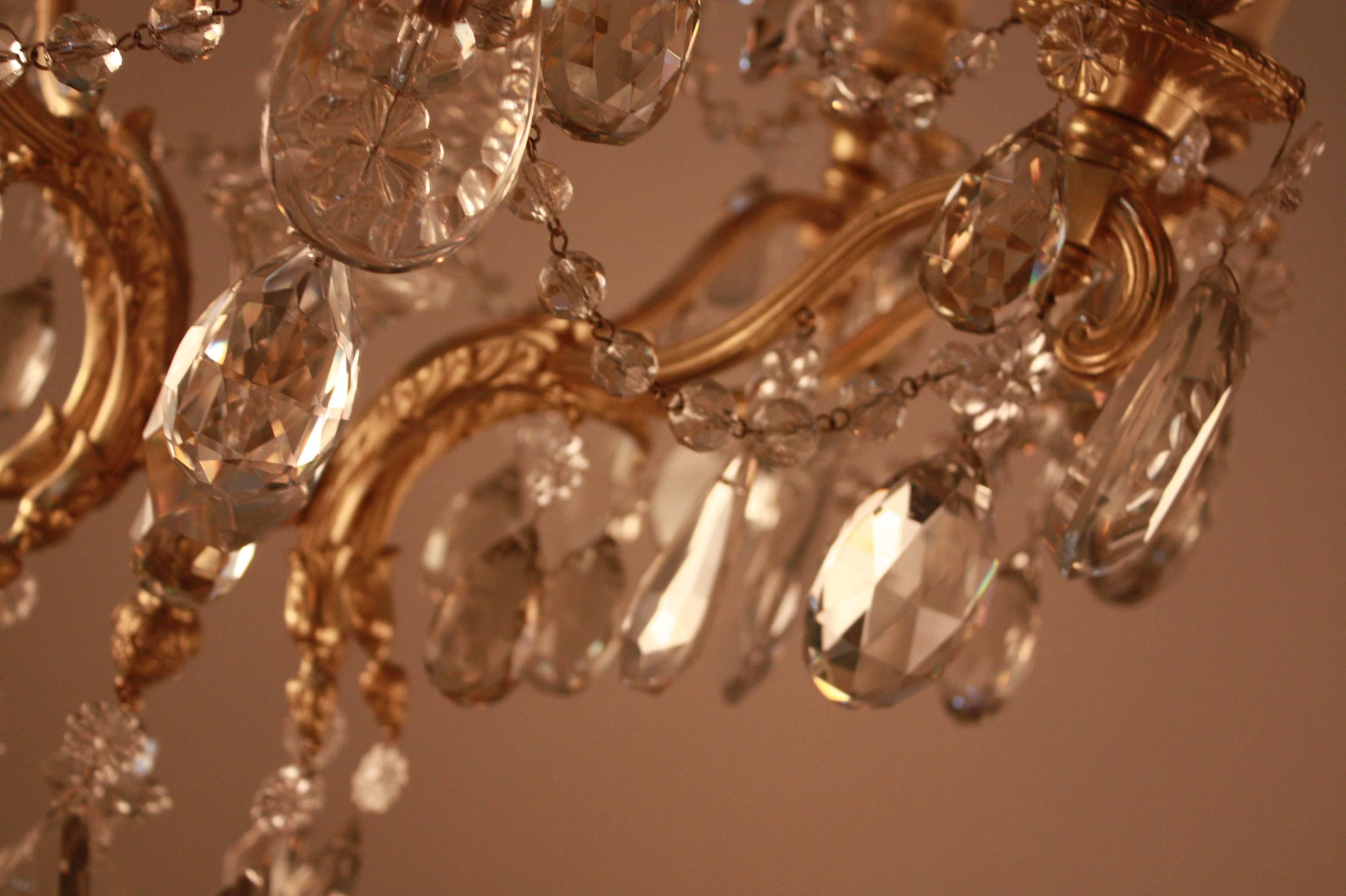 Mid-20th Century Elegant Crystal and Bronze Chandelier by Maison Baguès