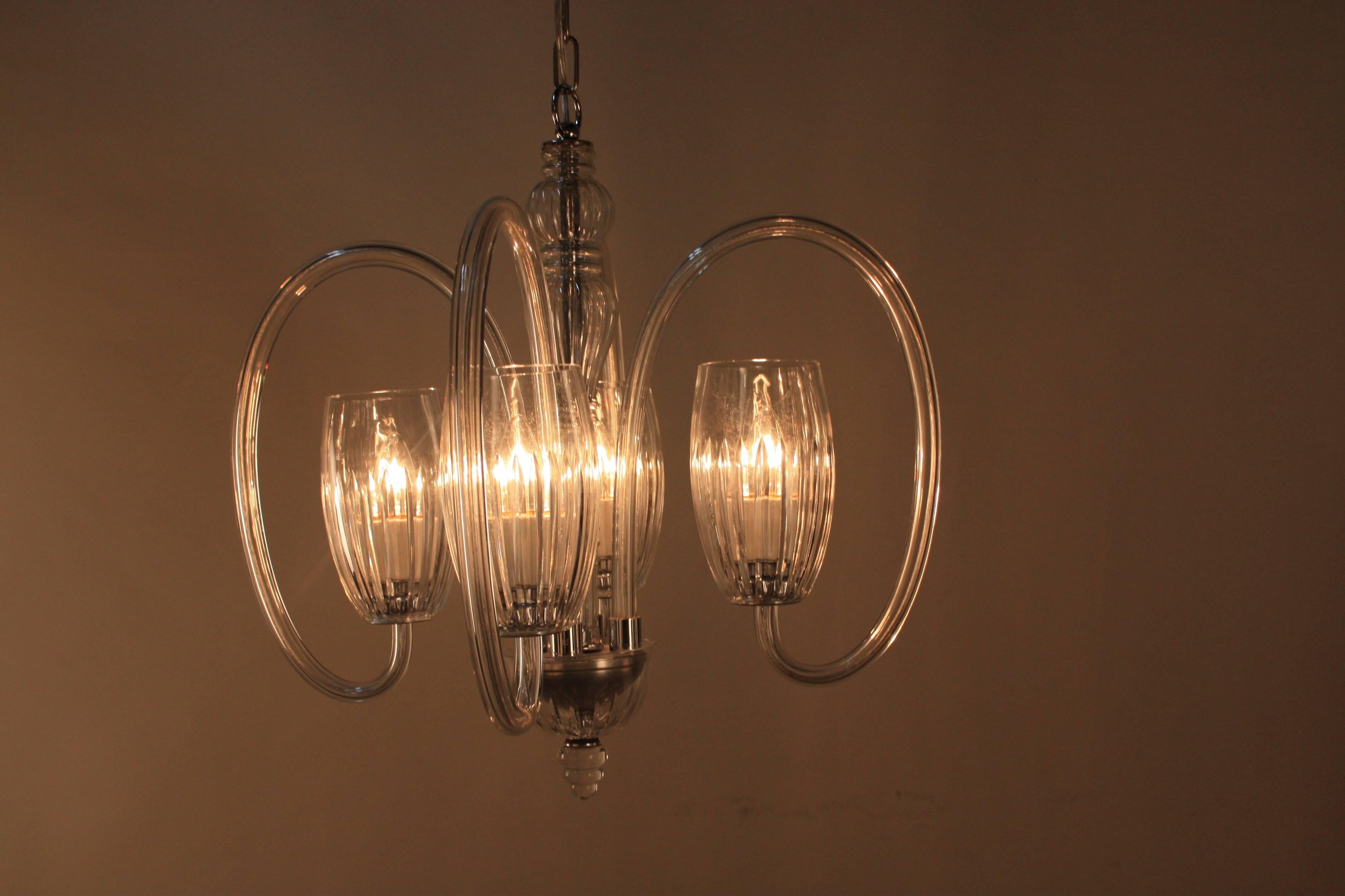 Simple but elegant 1970s four-light crystal chandelier.