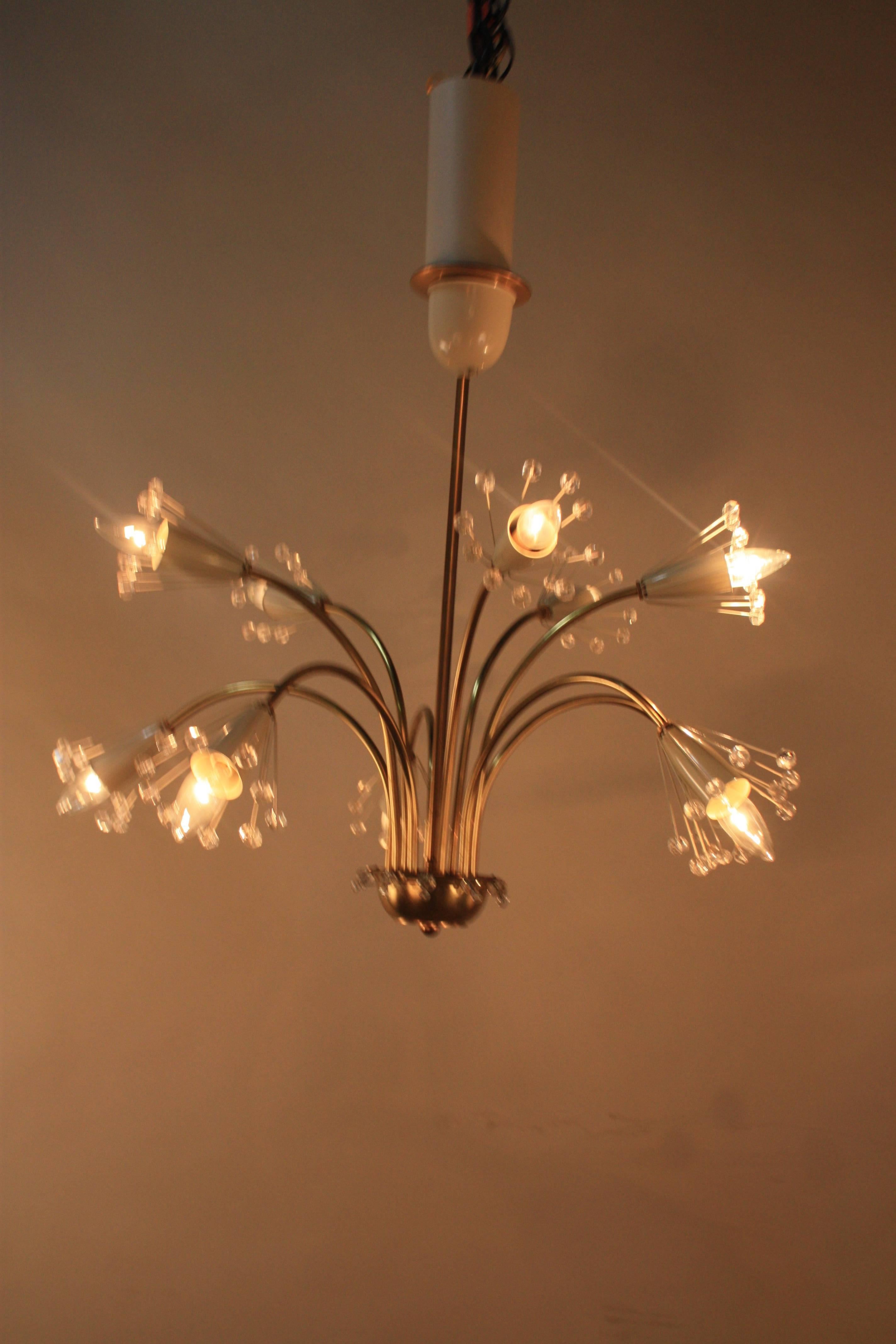 Elegant ten-light bronze and crystal Sputnik chandelier by Emil Stejnar.