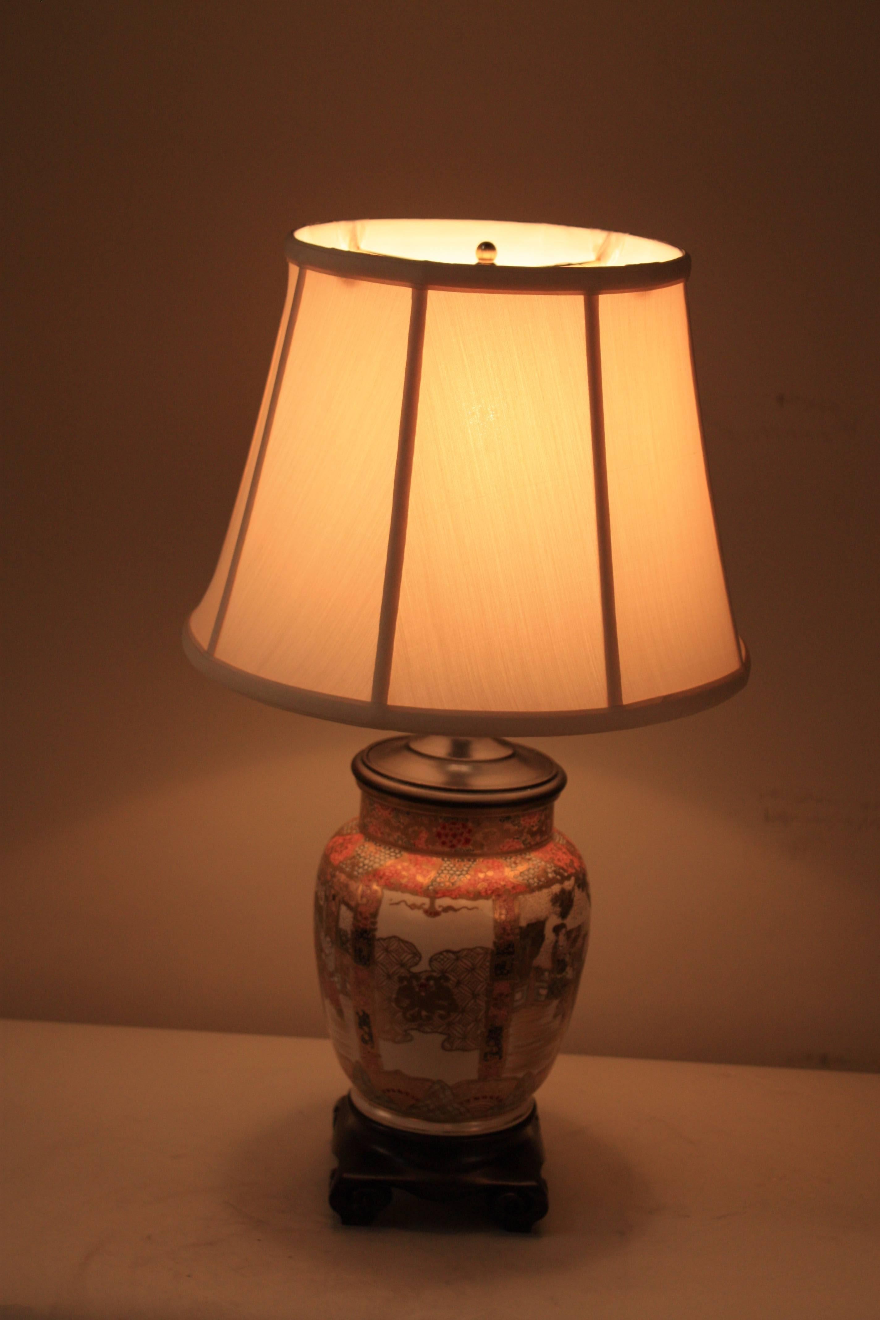 Japanese 19th century import to France and were mounted with bronze for oil lamp and now has been modified, electrified and fitted with silk lampshades.