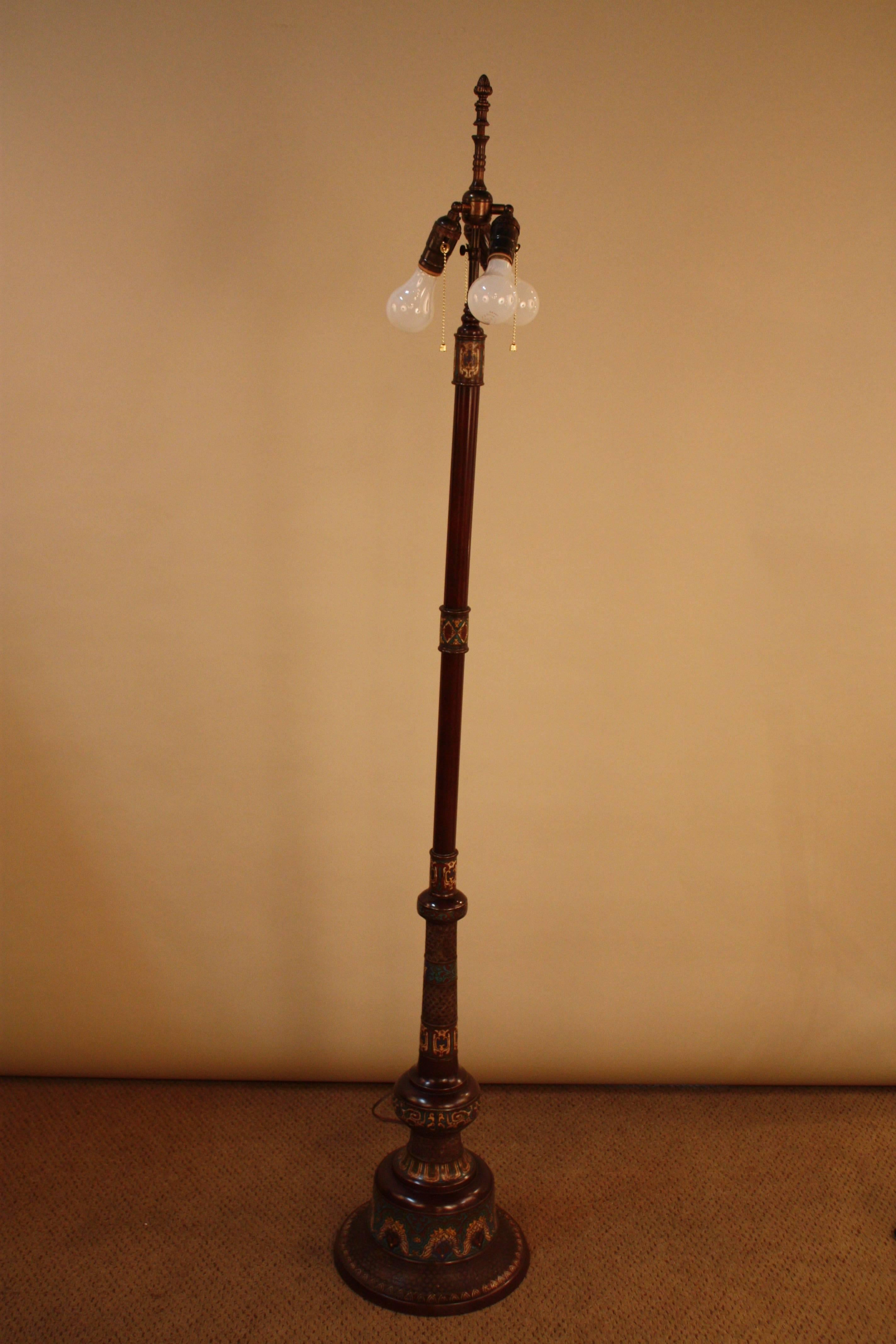 Bronze and exquisite detailing enamel work base, early 20th Japanese floor lamp fitted with handmade box pleased silk lampshade.
Three light 100 watt max each.