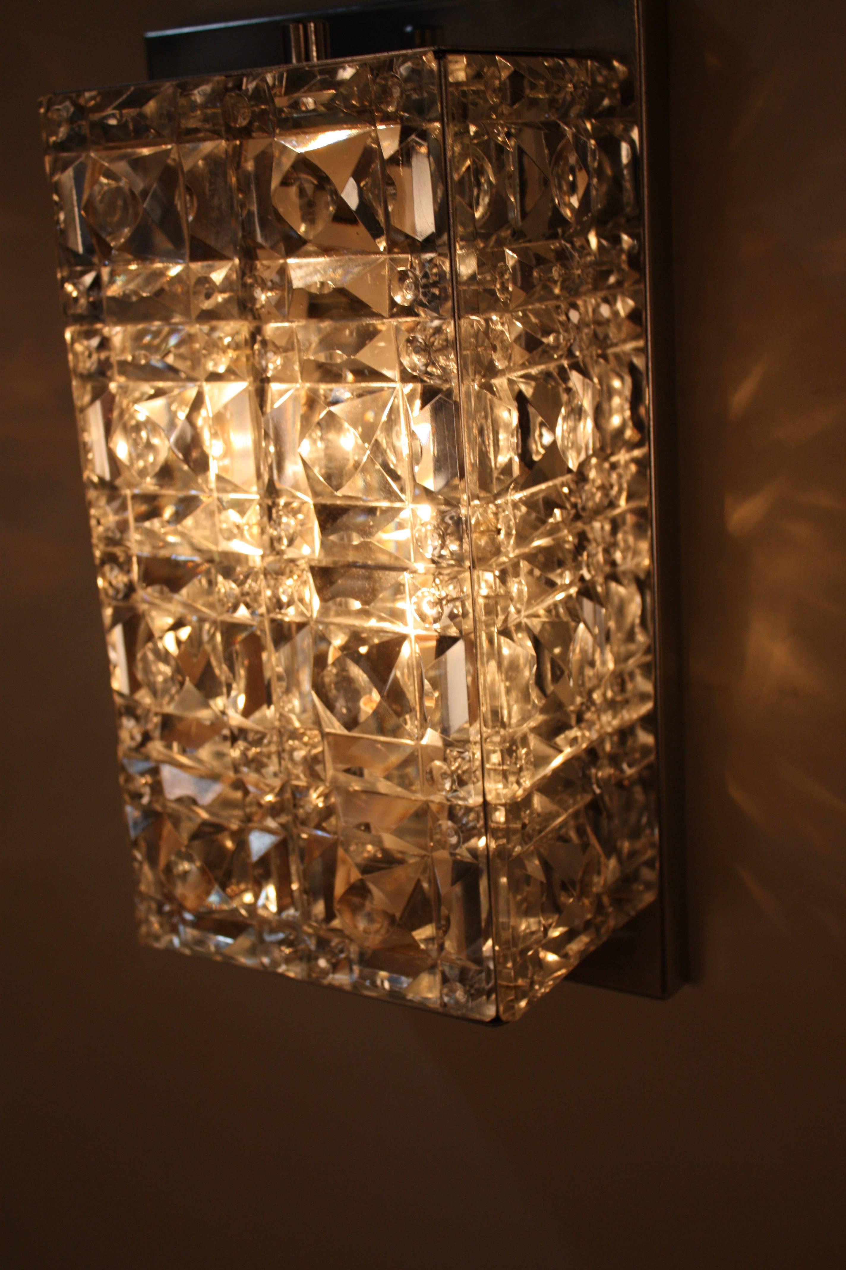 Pair of 1970s oblong modern style double light crystal and chrome wall sconces by Kenkeldey.