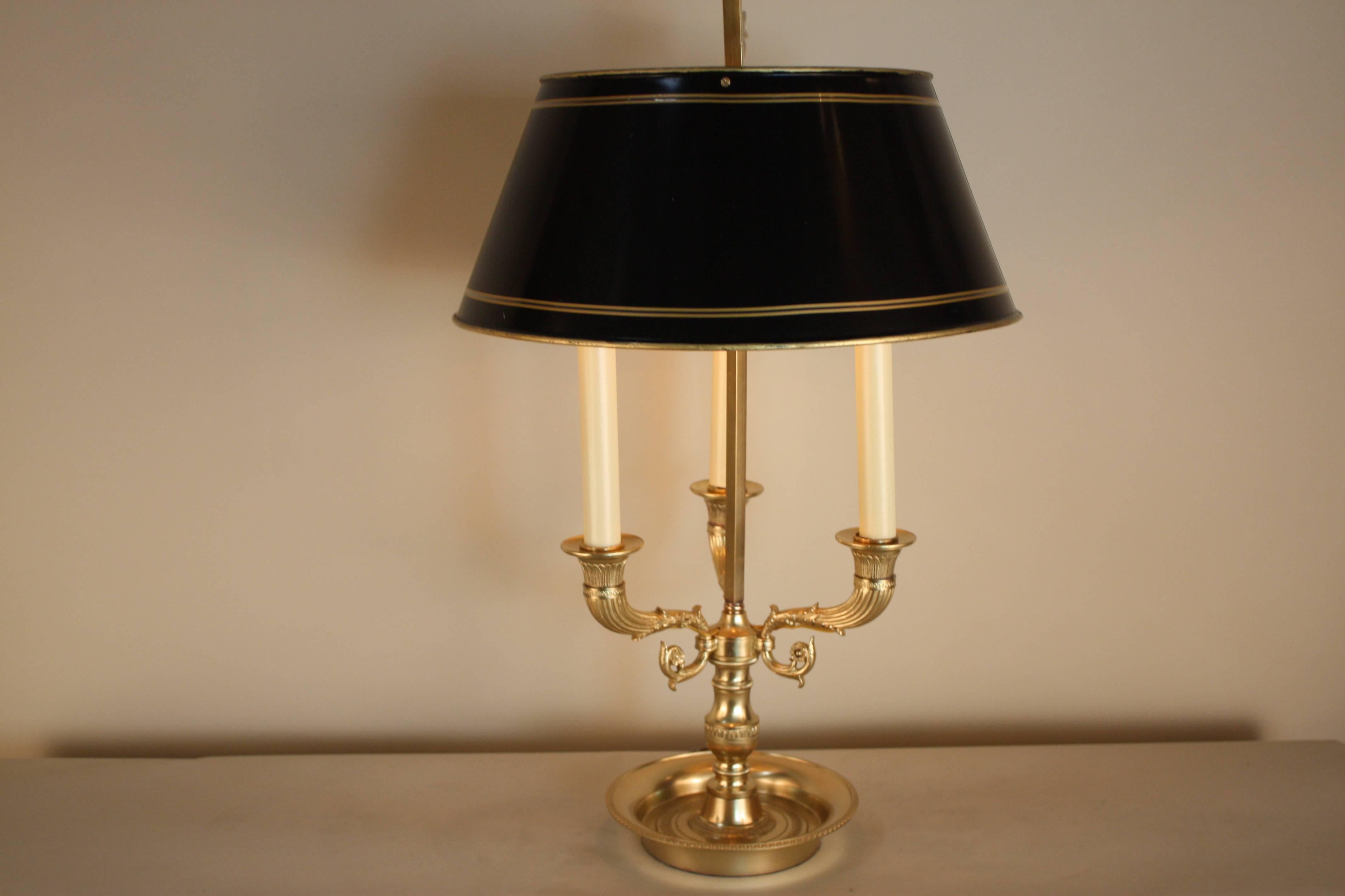 A French Empire style bouilotte table lamp with black lacquered lampshade 
total of five lights 60watt each.