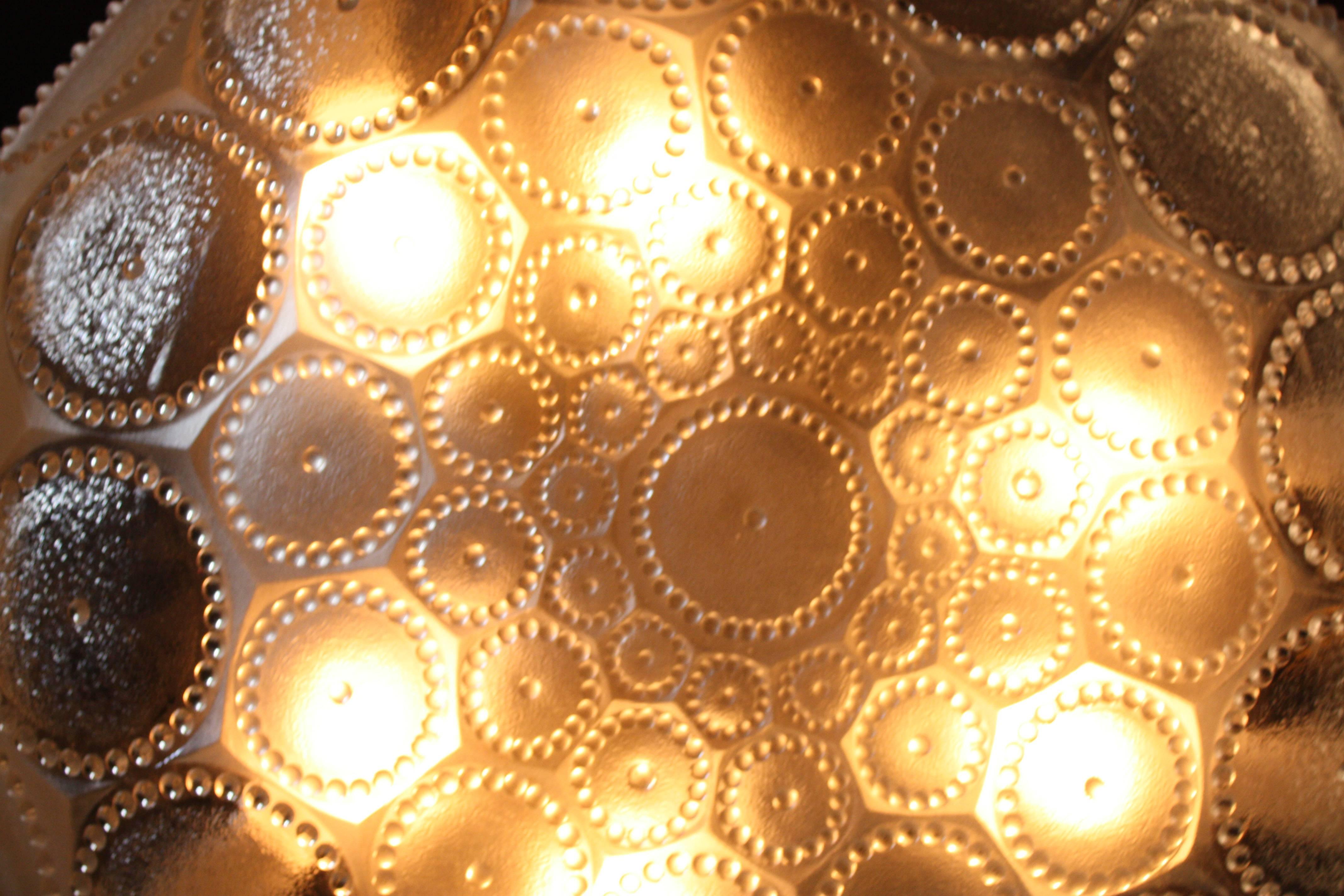 Texture glass Art Deco chandelier with bronze hardware.
Total of six light 60 watt each.
