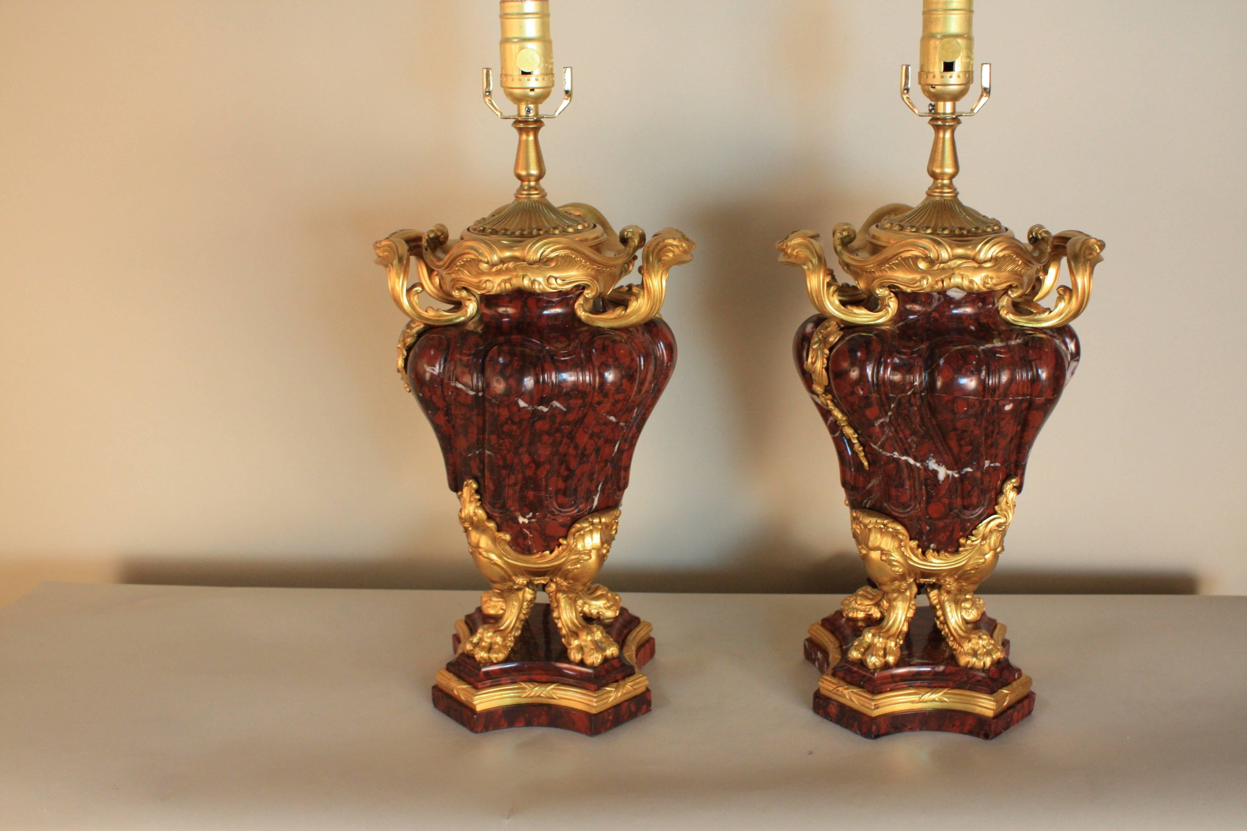 Pair of French of gilt bronze and rouge marble urns, circa late 19 century that professionally mounted as table lamps.