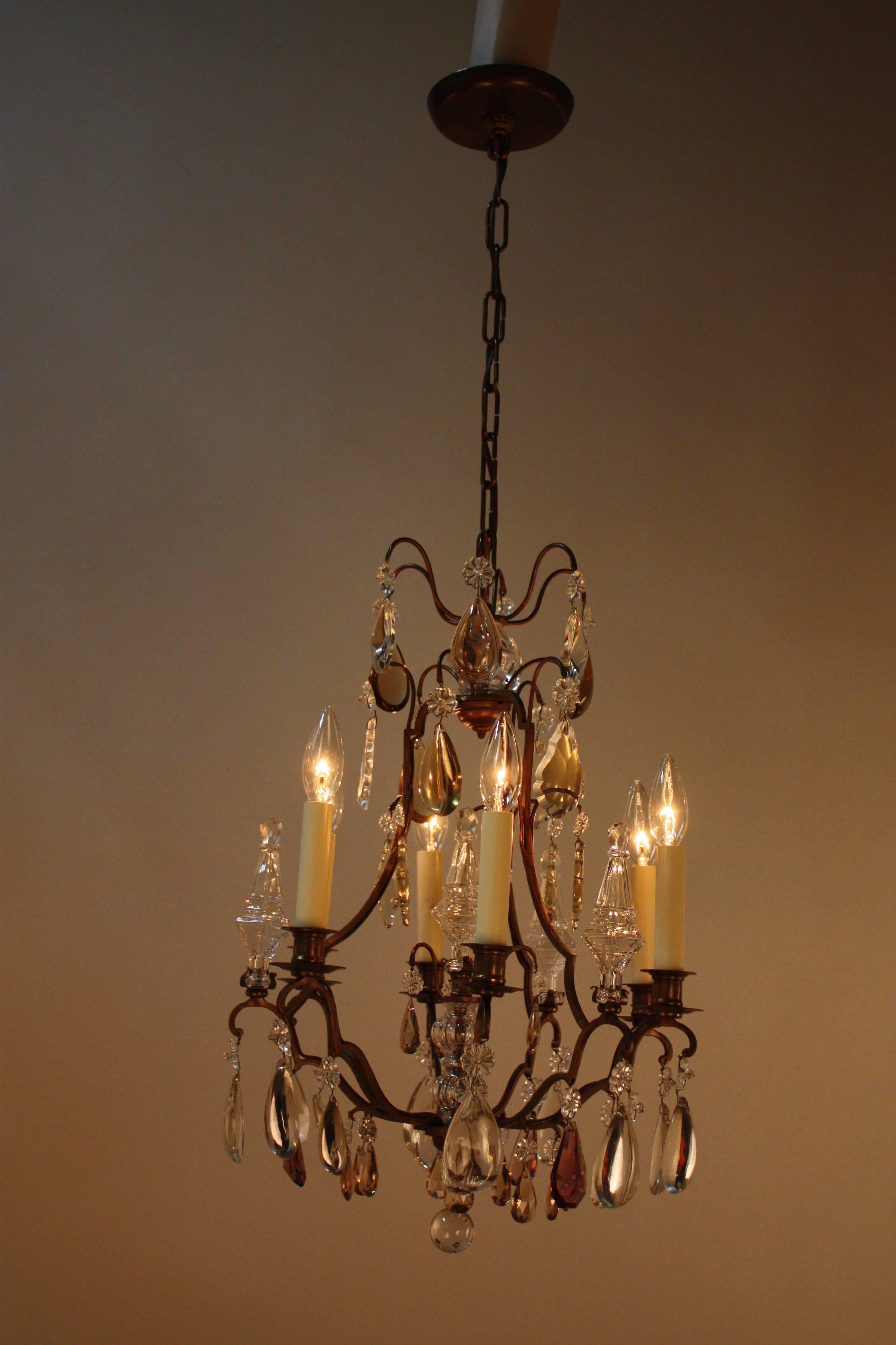 Elegant six-light crystal chandelier with beautiful bronze frame.
Fully installed height 24
