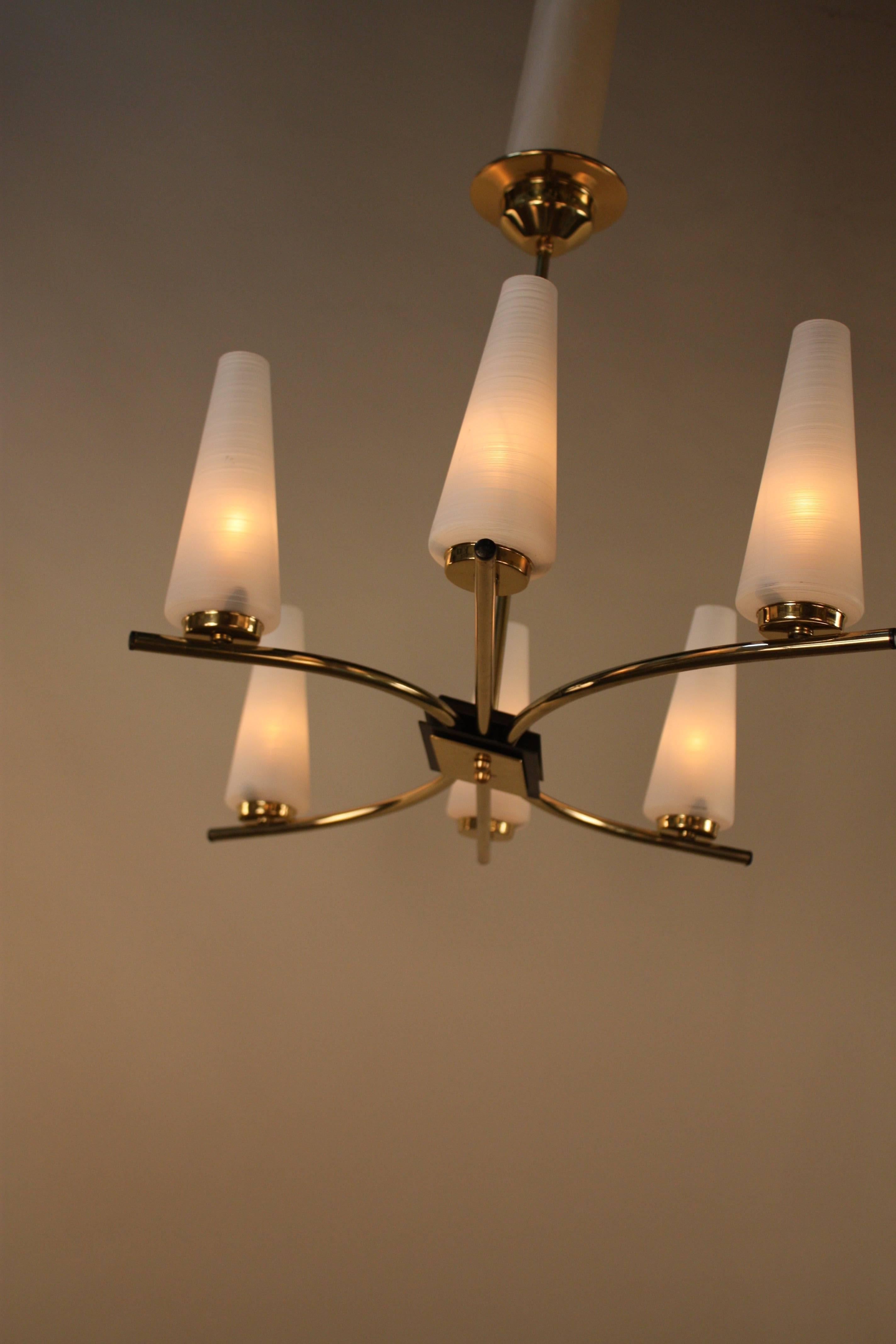 Elegant French midcentury six-light bronze chandelier with textured glass shades.