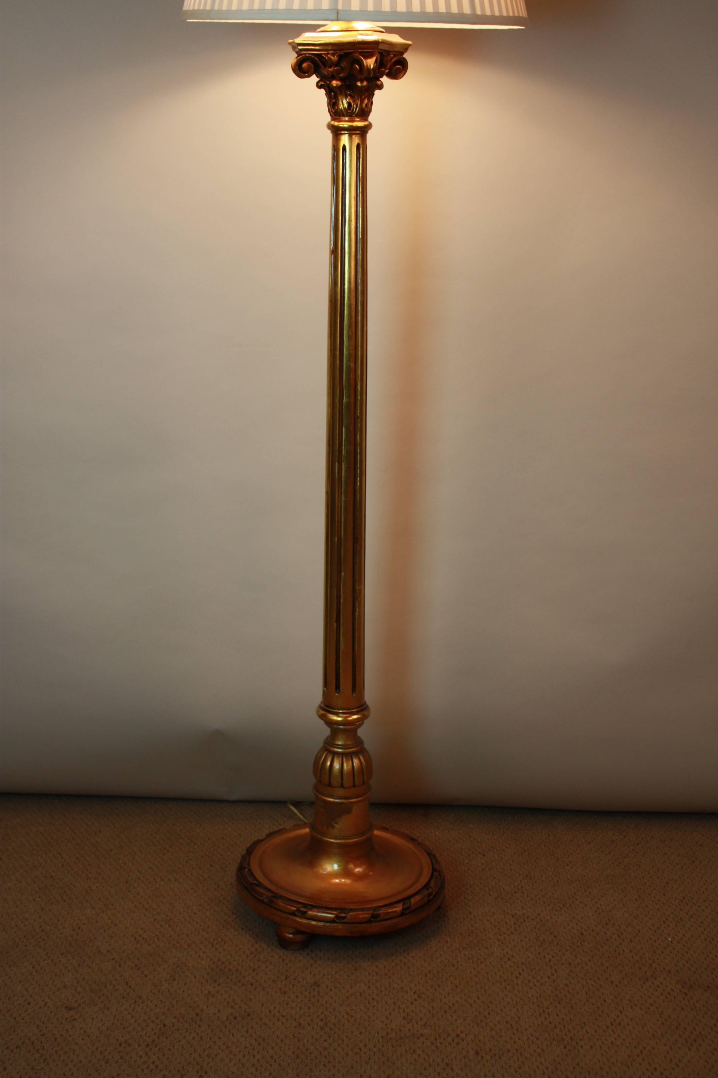 Spanish, 1930s giltwood floor lamp fitted with customized box pleat silk lampshade.
Three lights, 100 watts max each light.
 