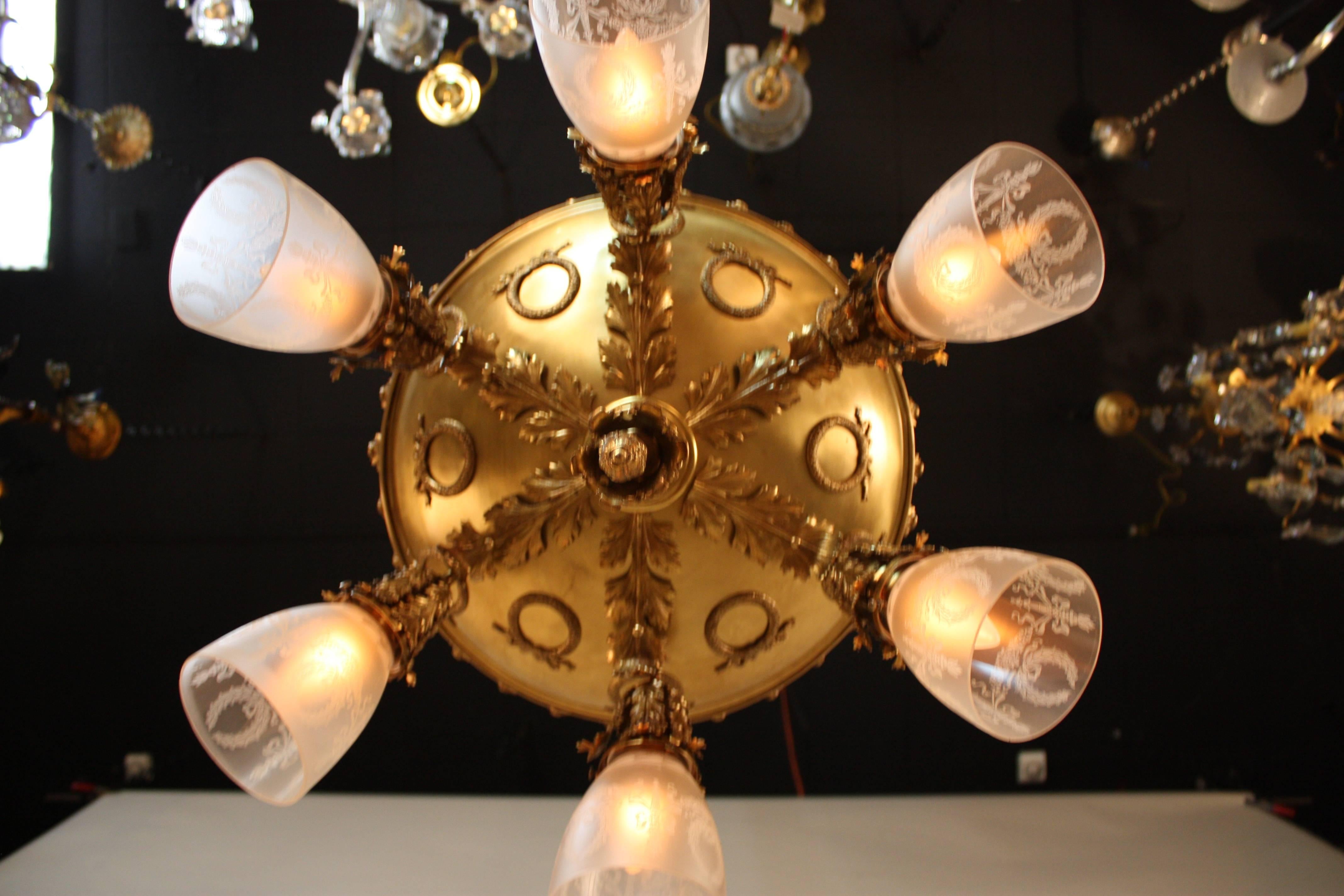 French 1920s bronze semi flush mount chandelier with six-light etched glass shades.
