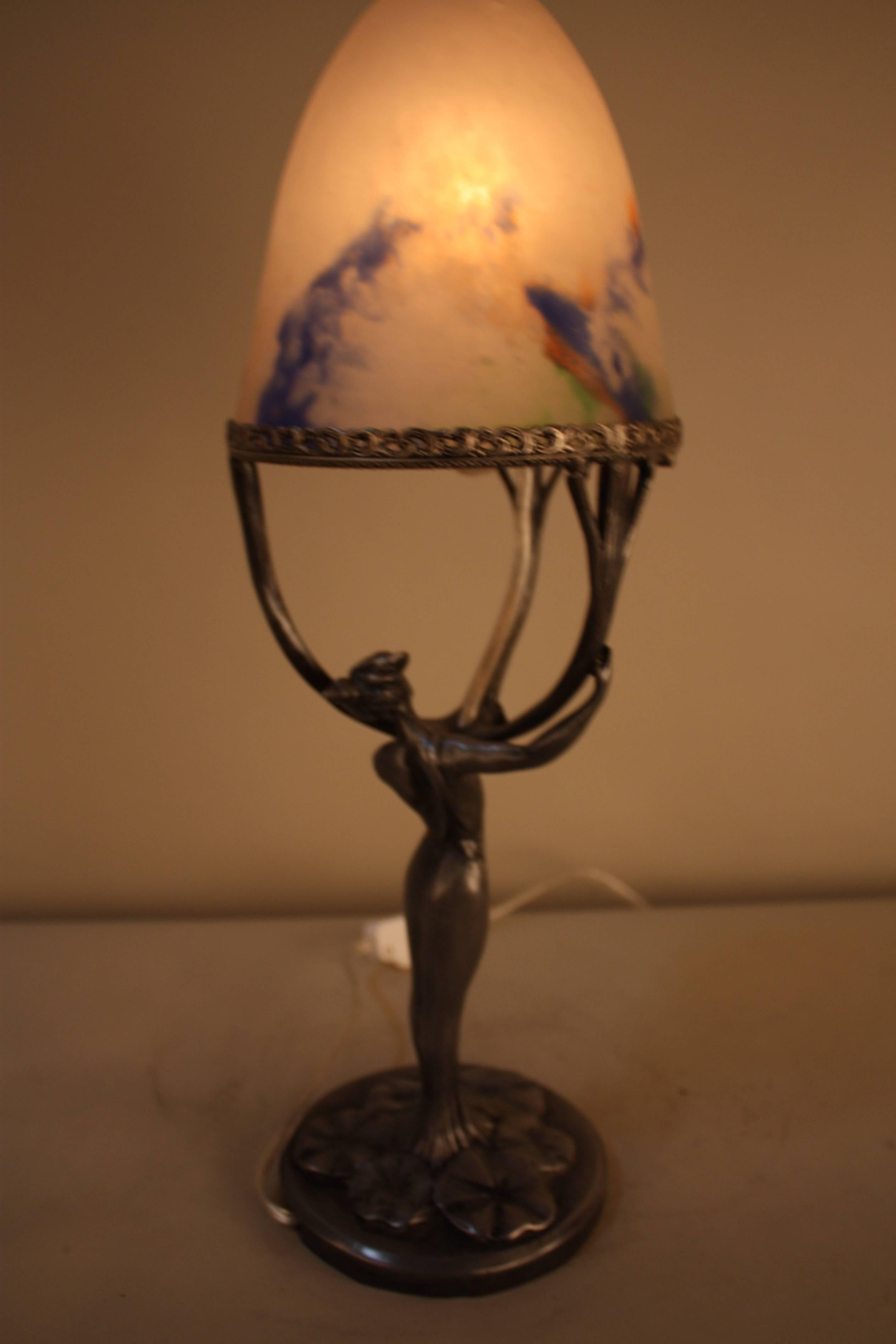 Beautiful Art Nouveau table lamp with blown glass shade.