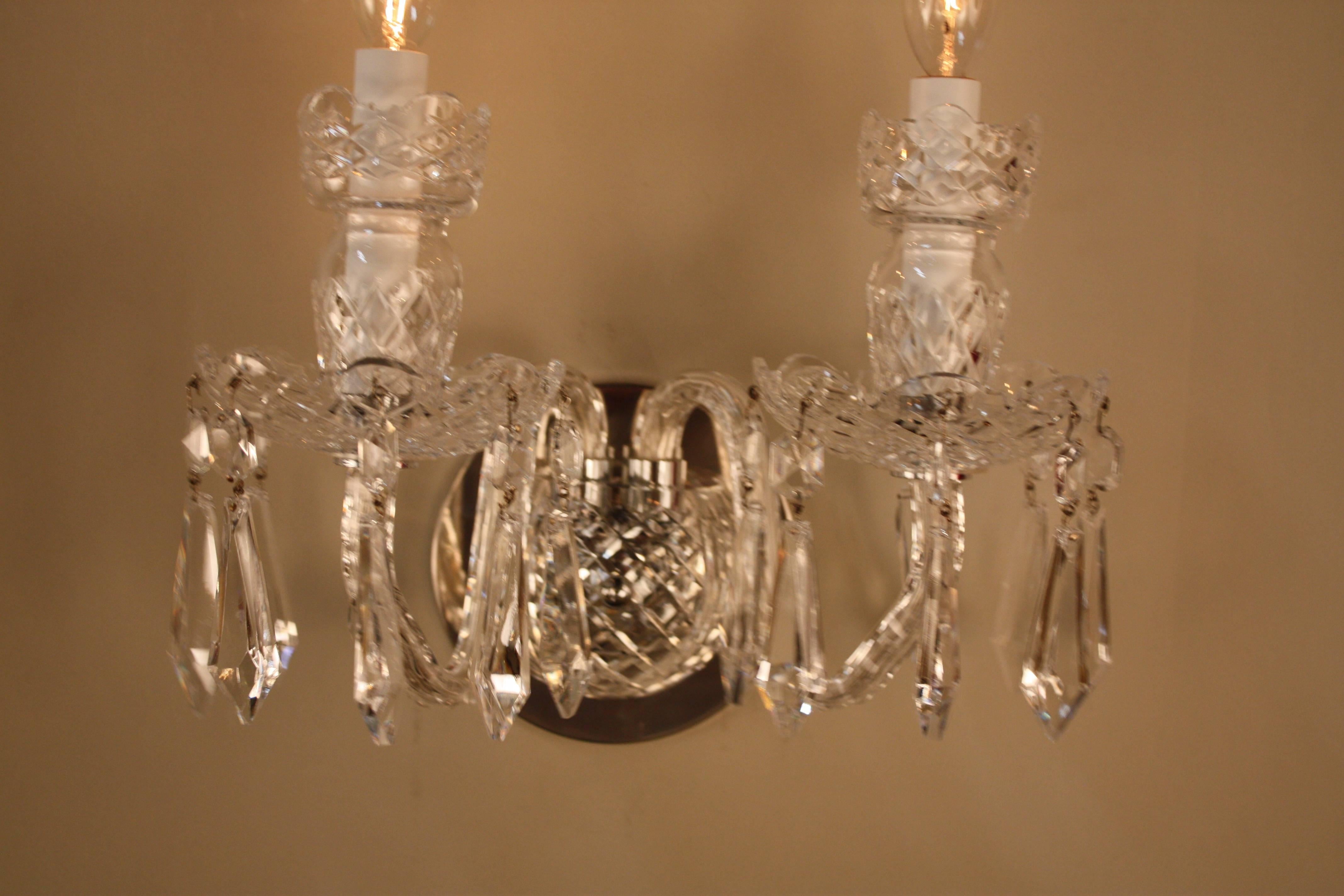 Pair of Classic design double arm Waterford Crystal wall sconces.
 