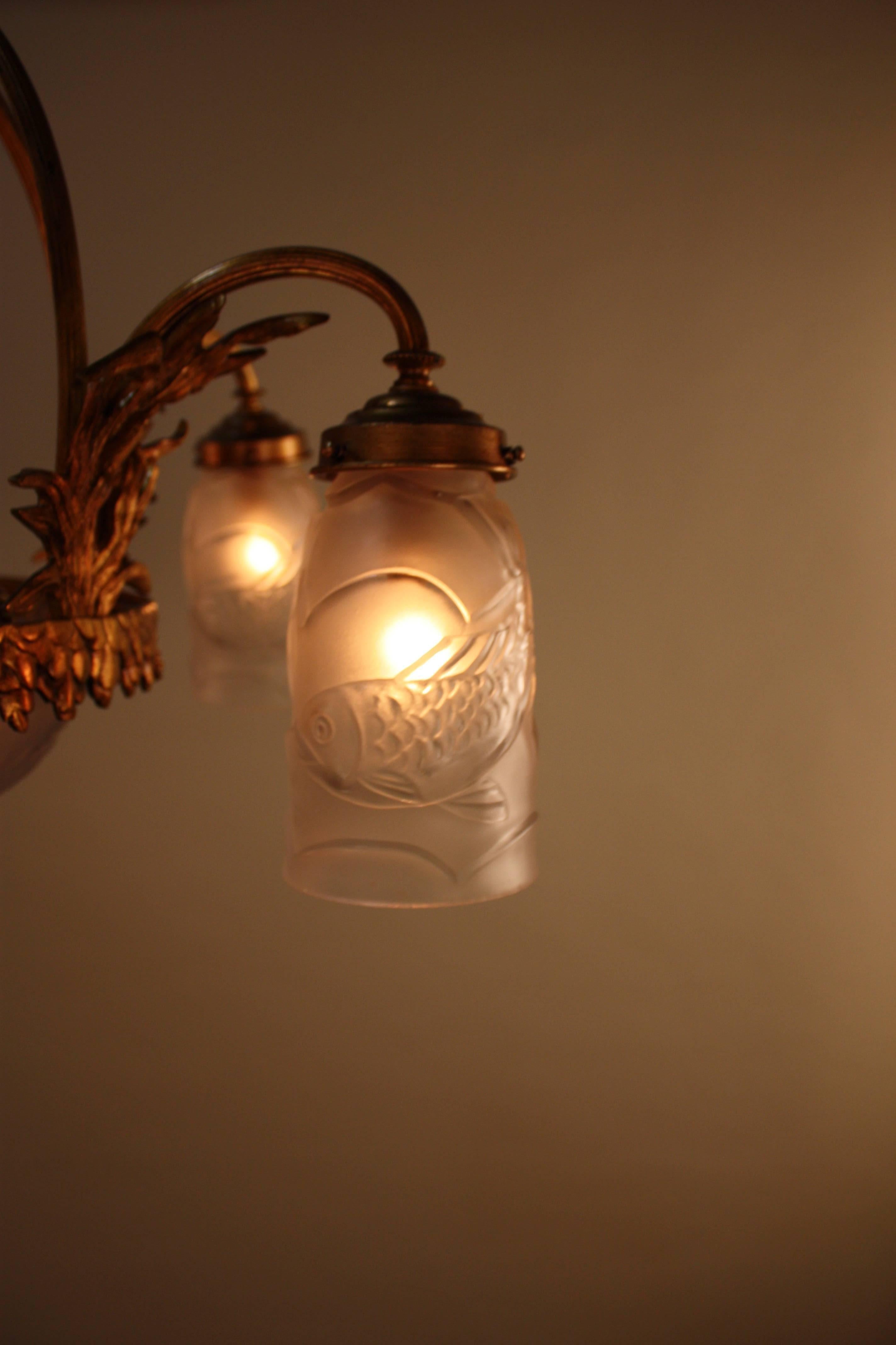 Mid-20th Century French Art Deco Bronze Chandelier with Molded Glass Shades