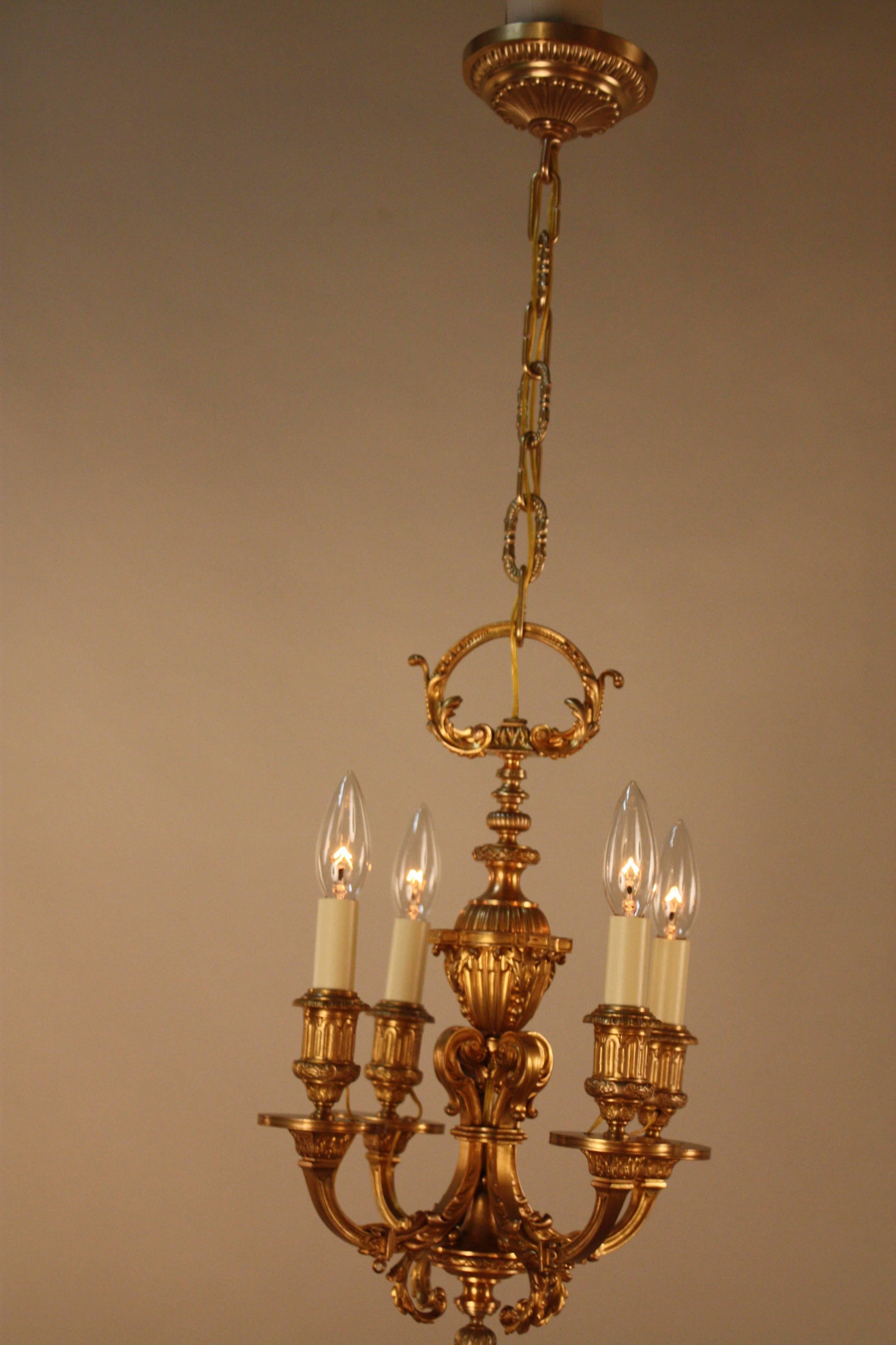 Elegant four light Dore bronze chandelier.
Minimum height fully installed is 21