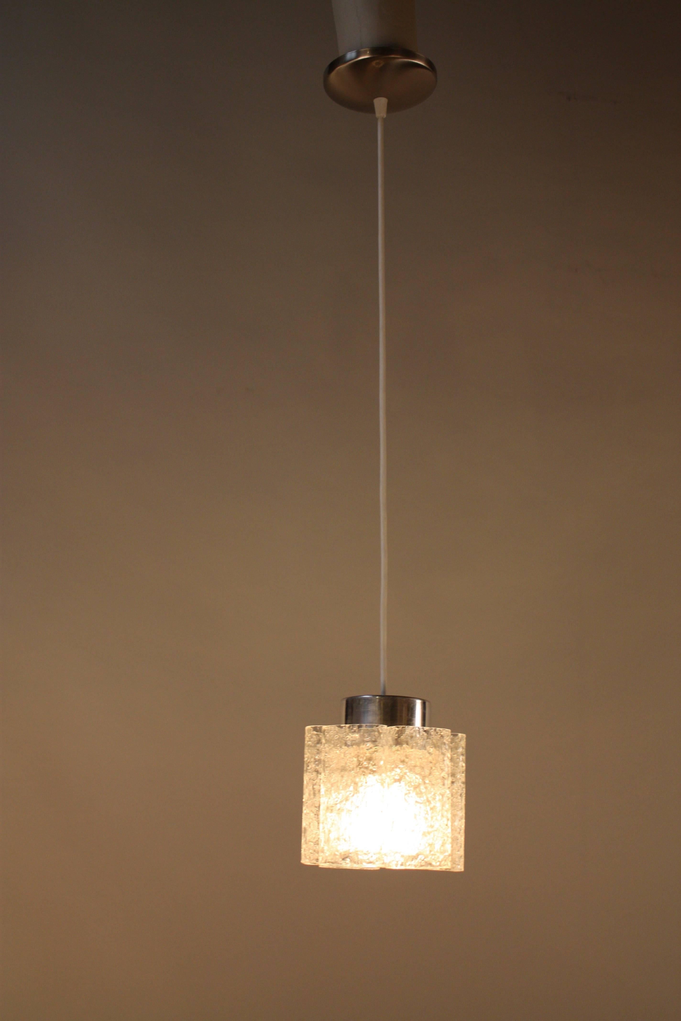 Set of three 1970s textured glass single light pendant lights by Doria of Germany.
