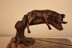 Bronze Dog Sleeping on a Tree Branch Sculpture