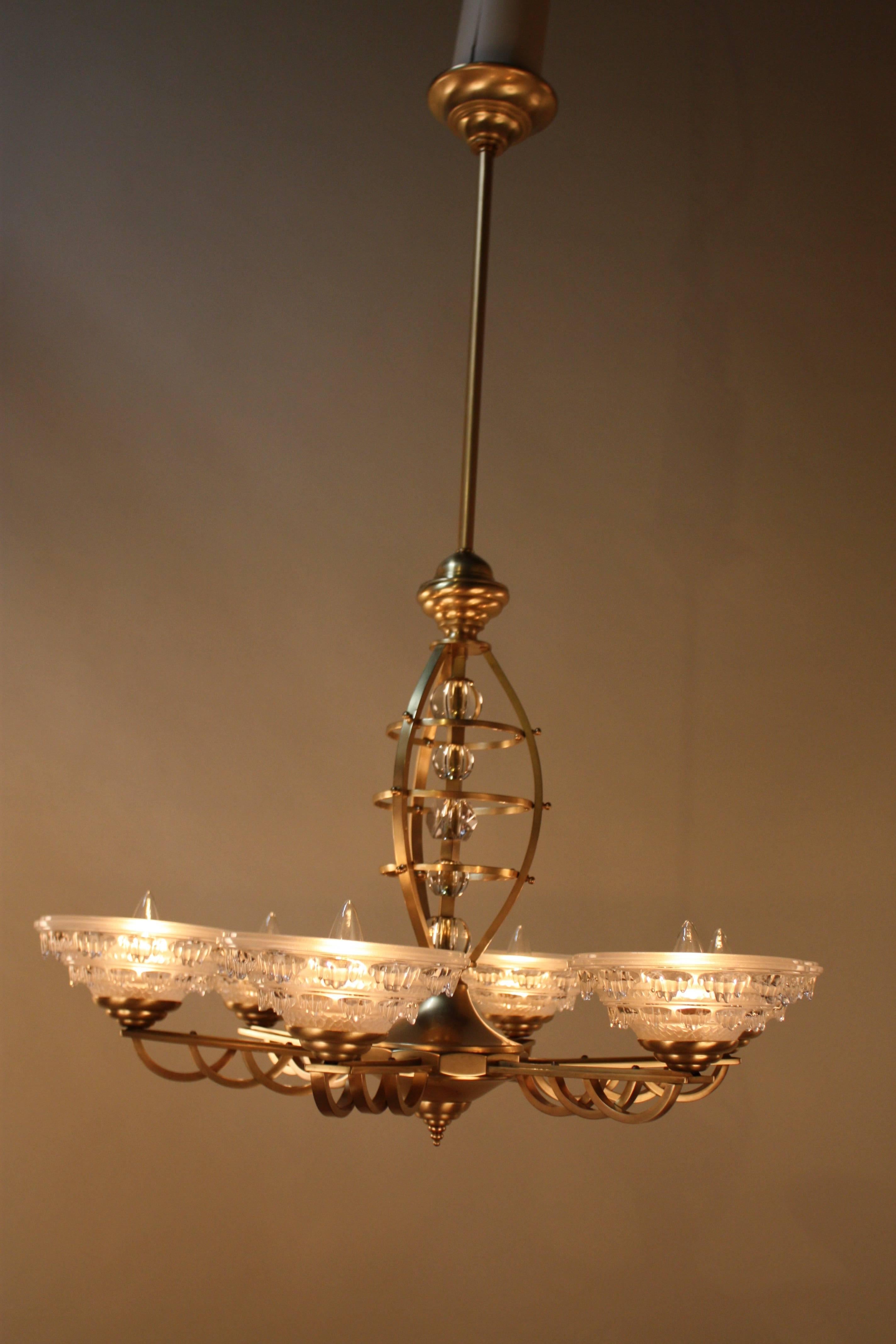 Very elegant and a rare design, six-light soft satin finish bronze with clear color frost glass shades. 
Height can be adjusted by cutting the upper rod.
