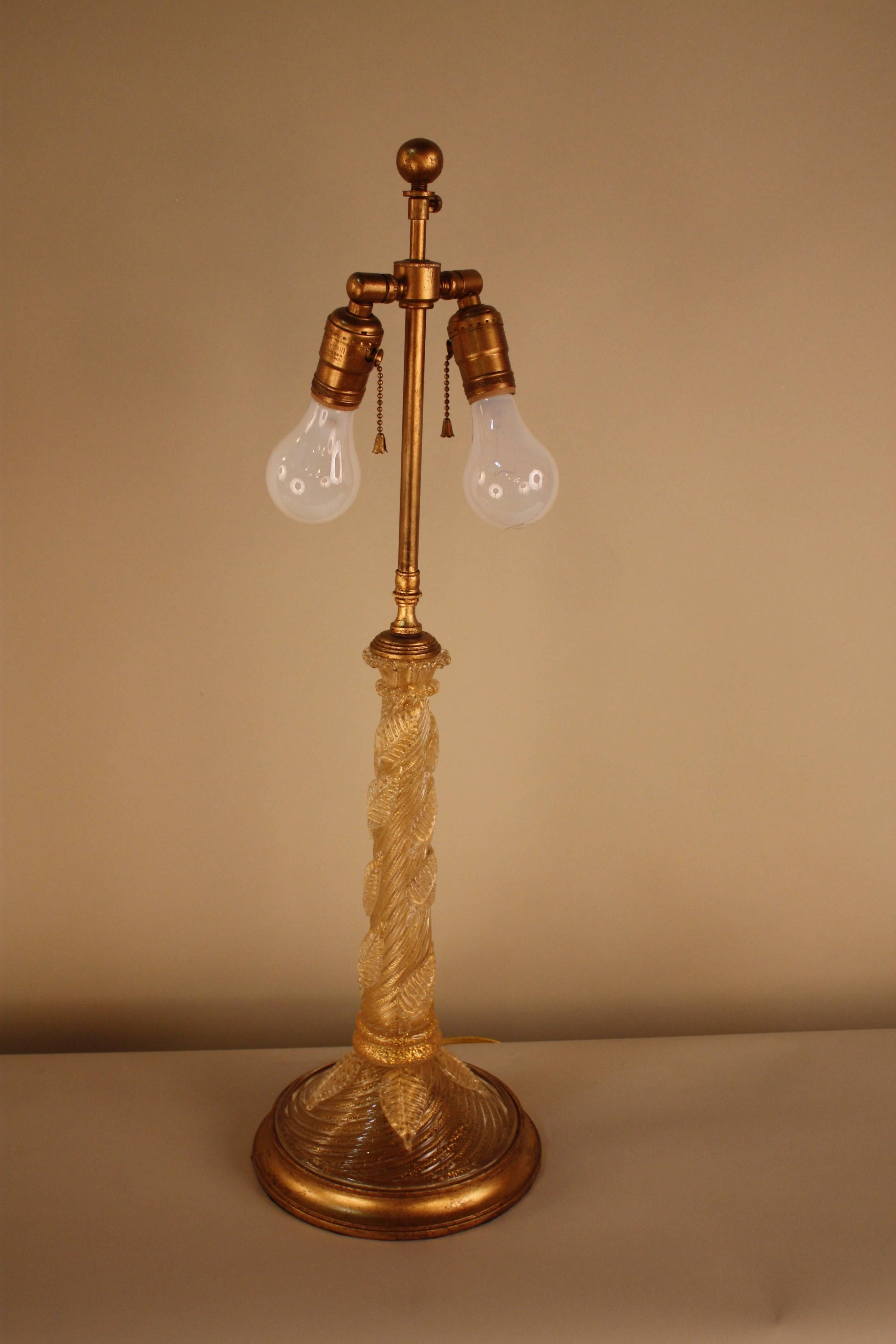 Golden Murano hand blow glass twist column table lamps with gold leaf wooden base.