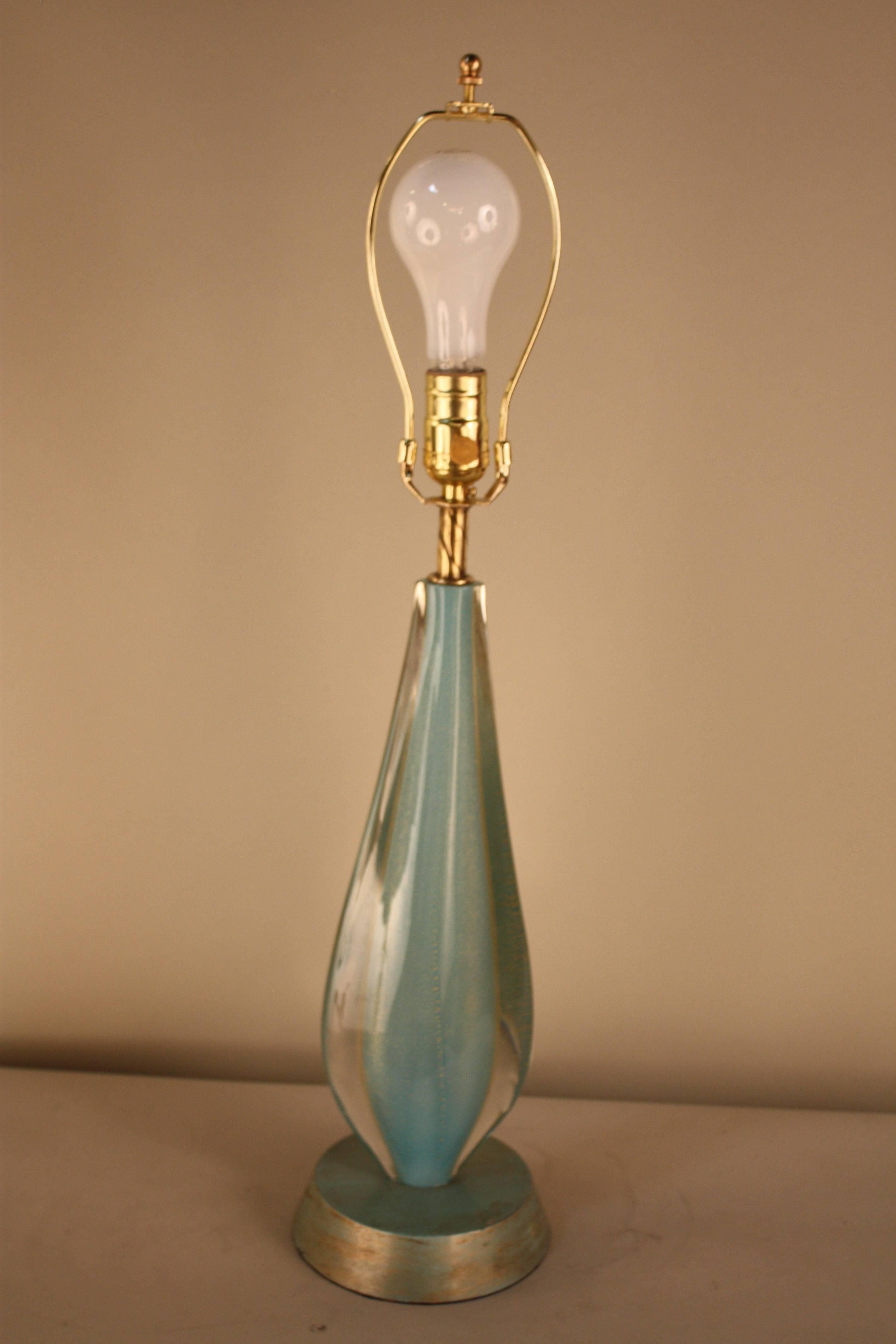 A simple but elegant design handblown clear color glass, with Turquoise color in the centre table lamp.