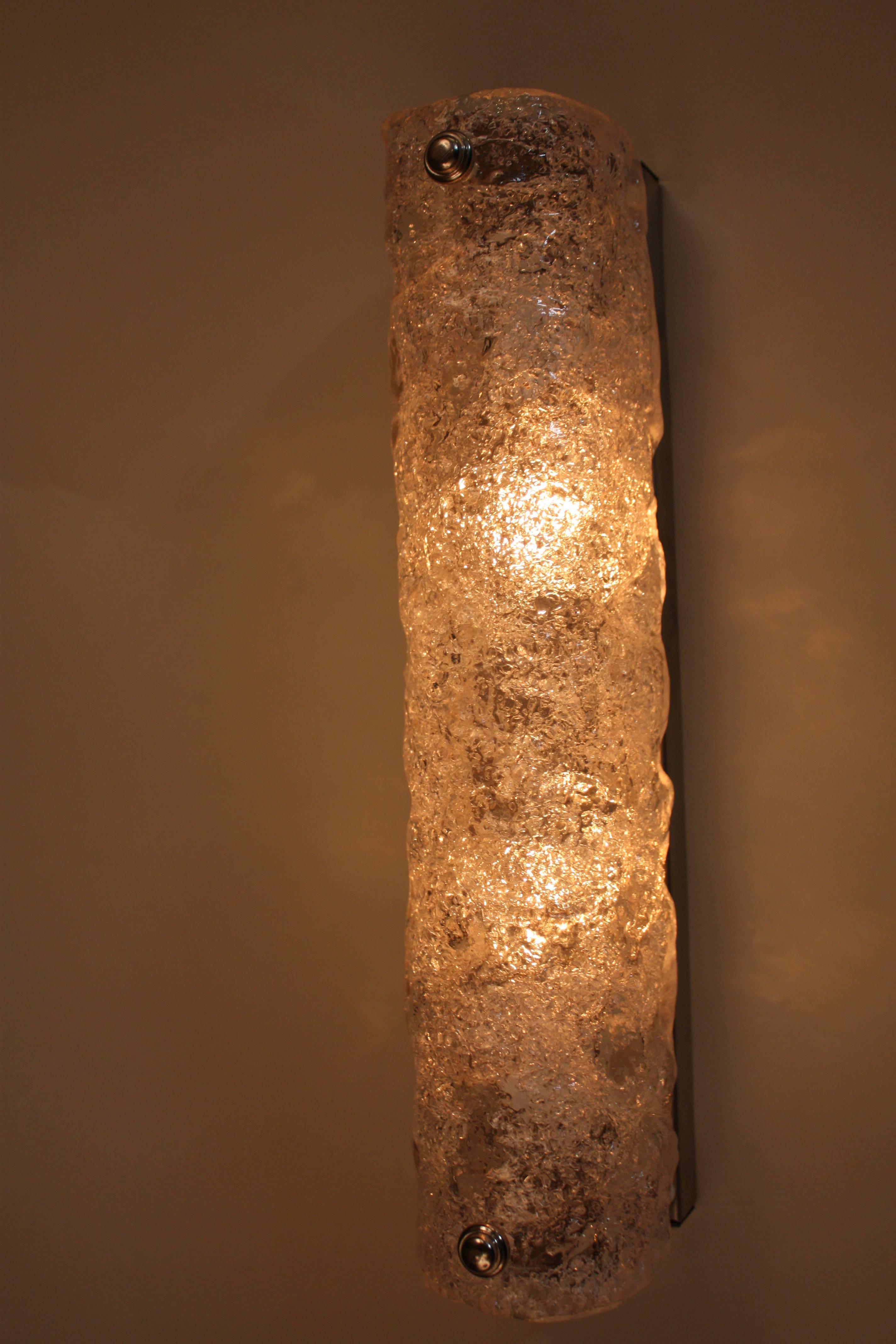 Double light textured glass, stainless steel wall sconces by Uginox.
These wall sconces can be mounted vertical or horizontal.