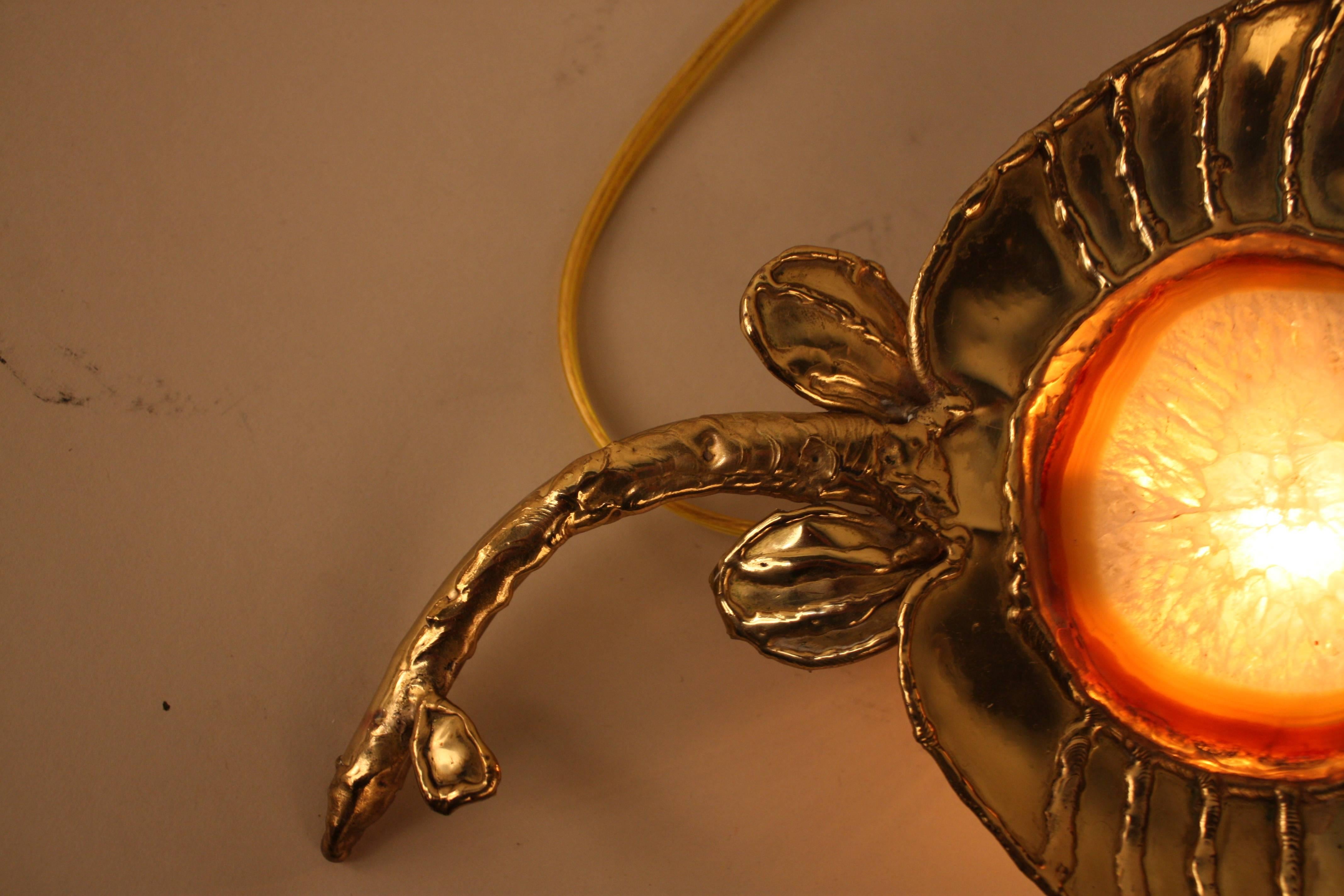 A stingray shark table lamp, sconce in bronze and agate.