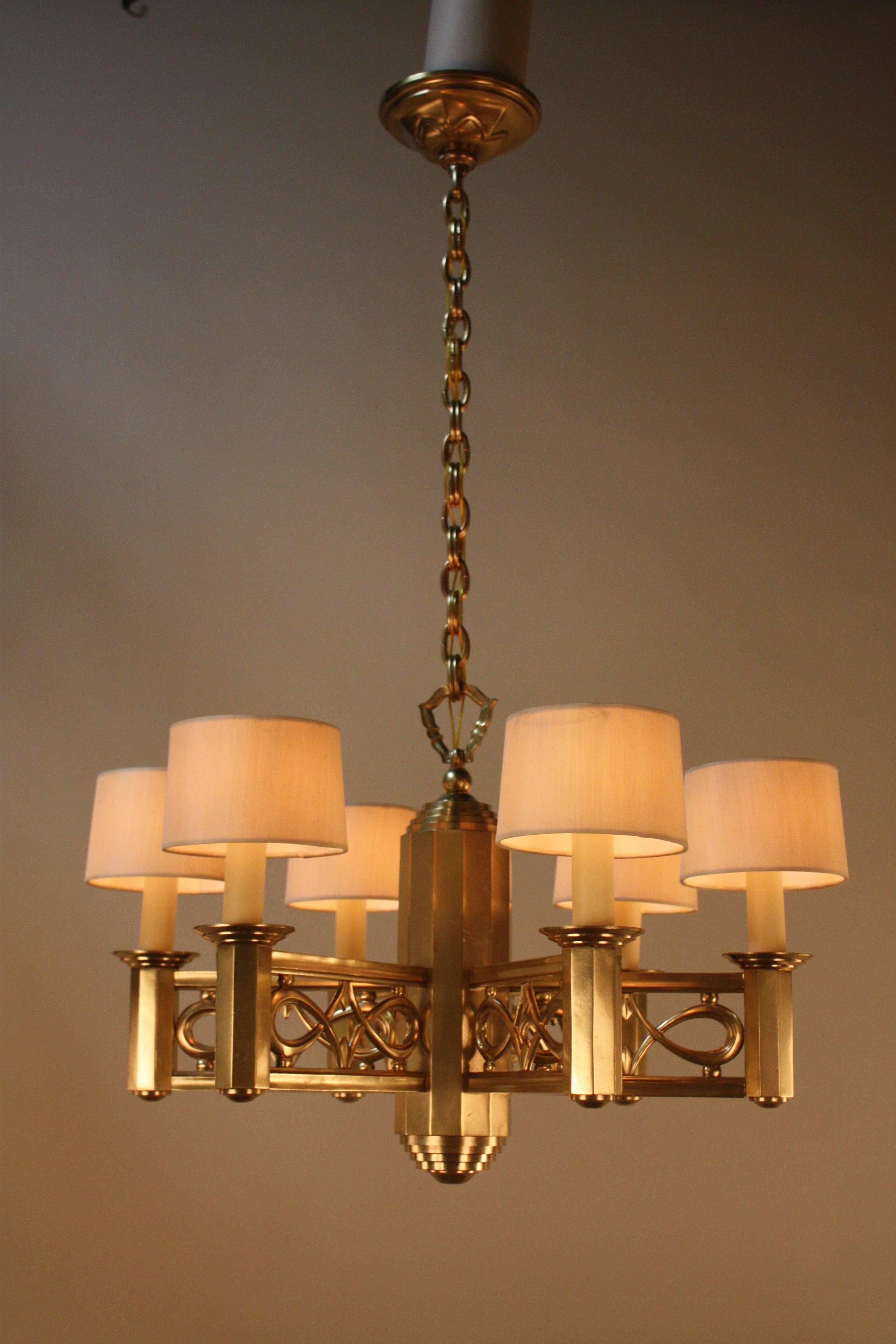 Elegant, beautifully designed six-light bronze chandelier 
Minimum height fully installed with one link of chain and canopy is 24' and has some extra chain.
