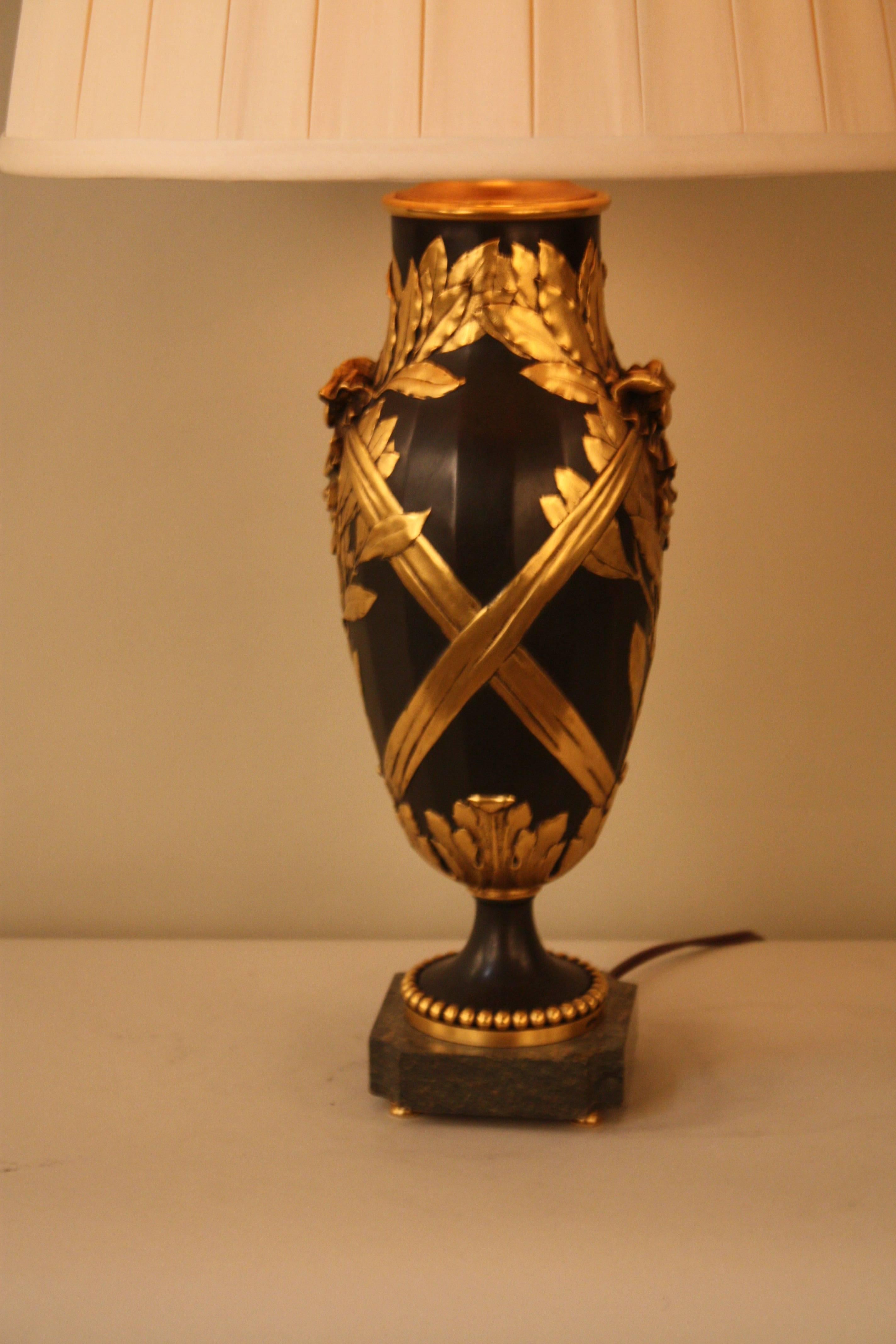 A French ormolu and patinated bronze vase that has been customized to a table lamp by Christofle et Cie.
 